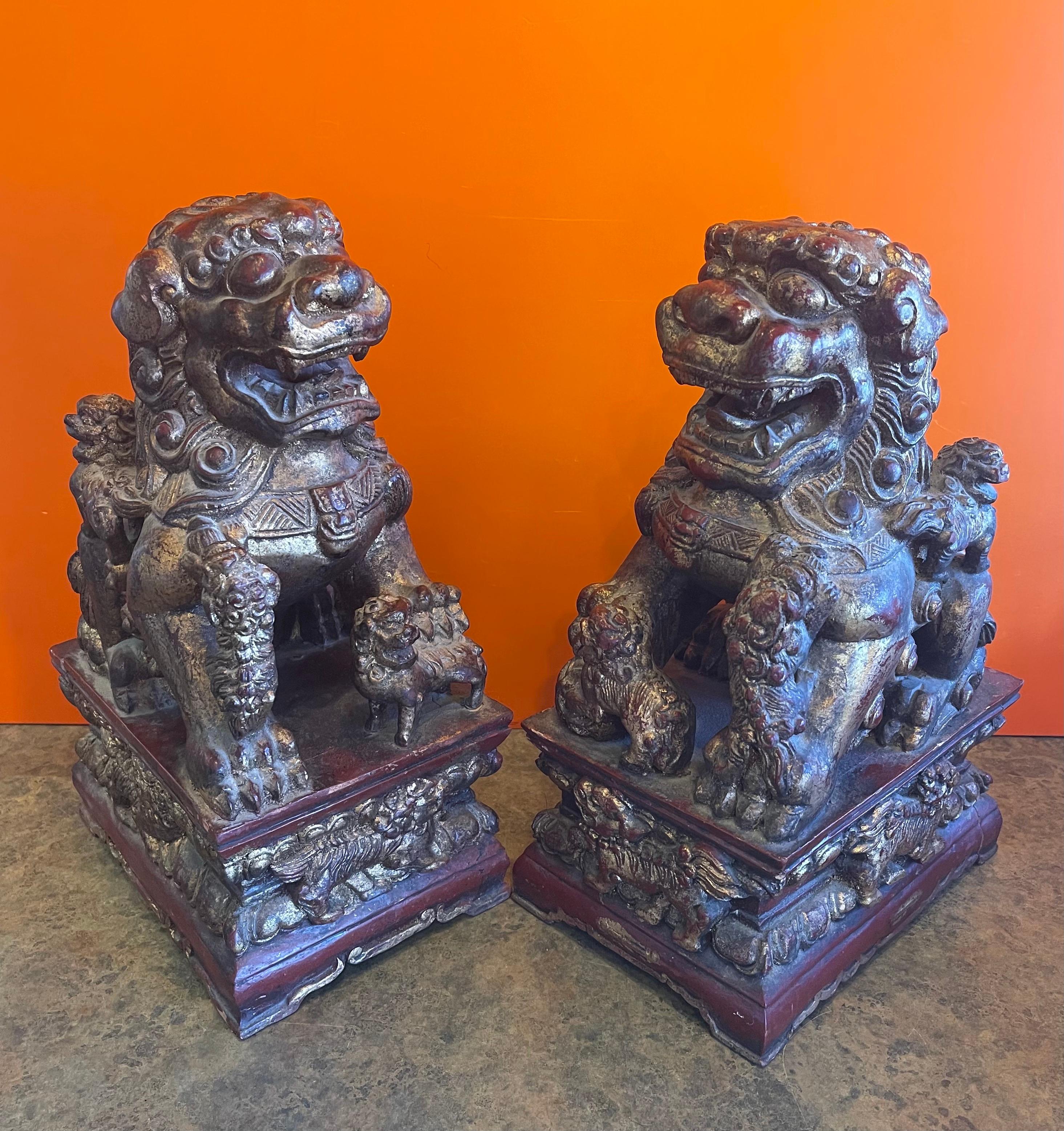 Wood Pair of Large Vintage Chinese Hand Carved Gold Giltwood Foo Dogs For Sale