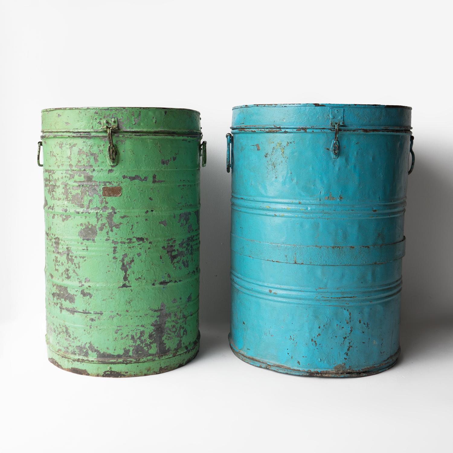 VINTAGE STORAGE BINS

Originating from Northern India, these would have originally been made to store grain such as rice or pulses.

Made from galvanised metal painted in typical Indian fashion with vibrant colours, in this case, one is a kingfisher