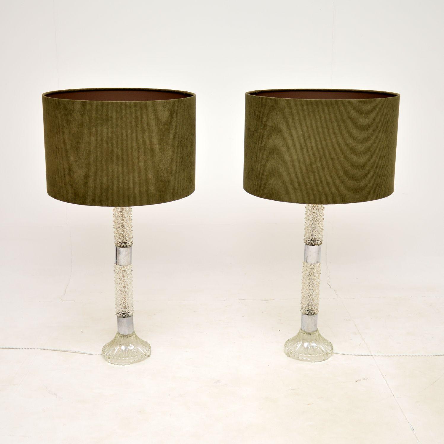 A very impressive and stylish pair of vintage table lamps. They were made in France, and date from the 1970’s.

They are very large and well made, the textured glass contrasts nicely with the chrome accents.

We have had these re-wired, they are