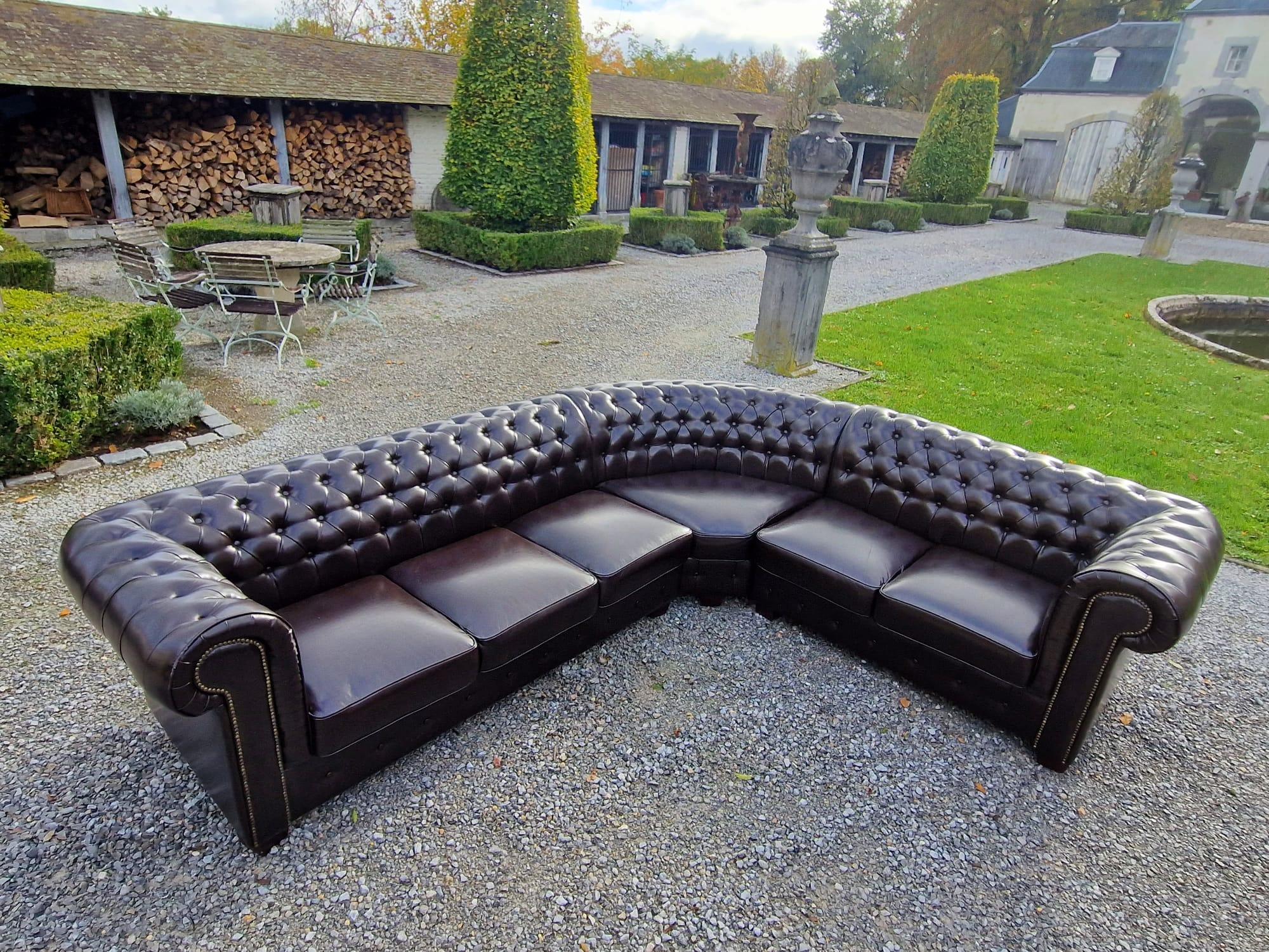Hand-Crafted Pair of Large Vintage Leather Corner Chesterfield Sofas For Sale