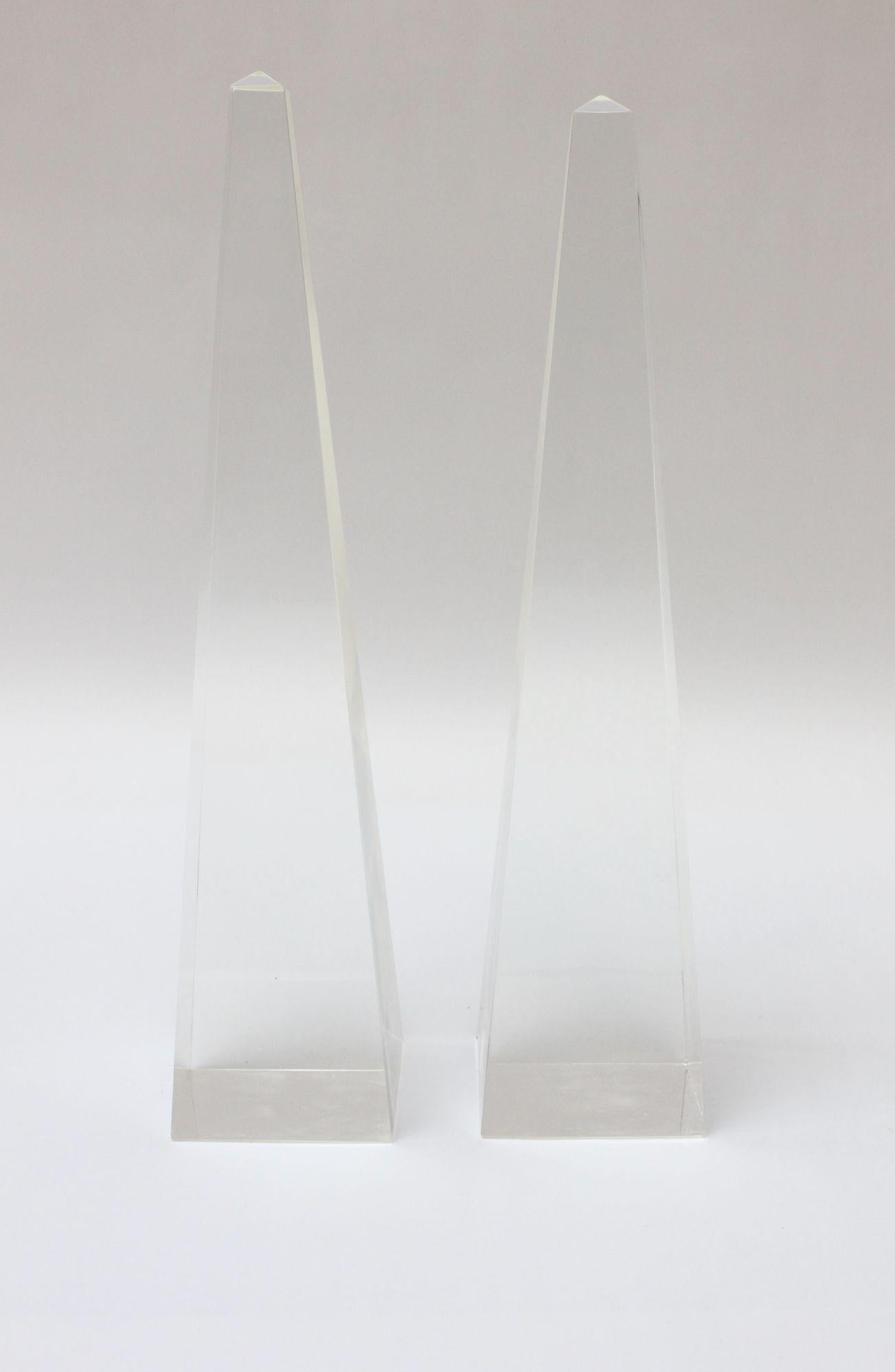 Hollywood Regency-Style lucite obelisks, ca. 1970s, USA.
Large-scale, statuesque decorative objects measuring H: 19.88