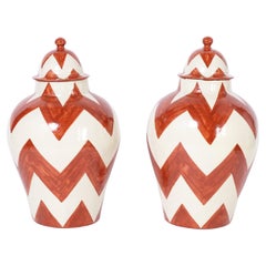 Pair of Large Antique Terra Cotta Lidded Urns with Chevron Designs