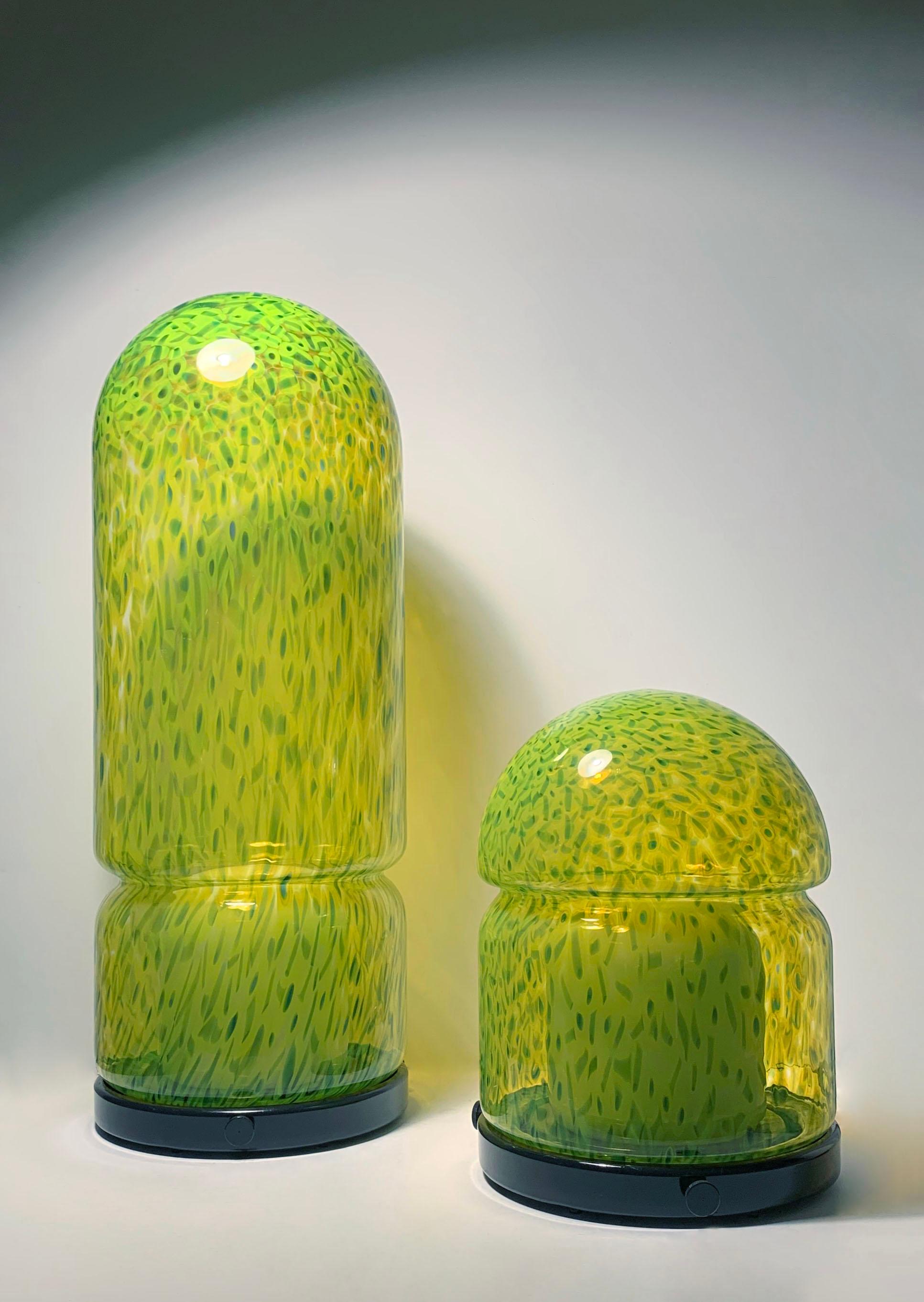 Pair of Large Vintage Vistosi Architectural Glass lamps by Gae Aulenti

One has a switch on the cord, the other does not. Just plugs in. A switch can be added easily on the cord if desired. 

Short: 15.5