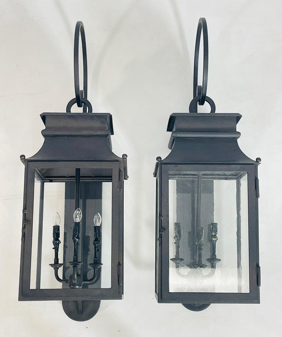 Pair of large wall sconces designed and manufactured in Los Angeles California by Paul Ferrante and part of the 4000 Series.

The sconces were manufactured in 2017.

Each piece has two lights inside and are labeled.

Measurements:
33.50 inches high