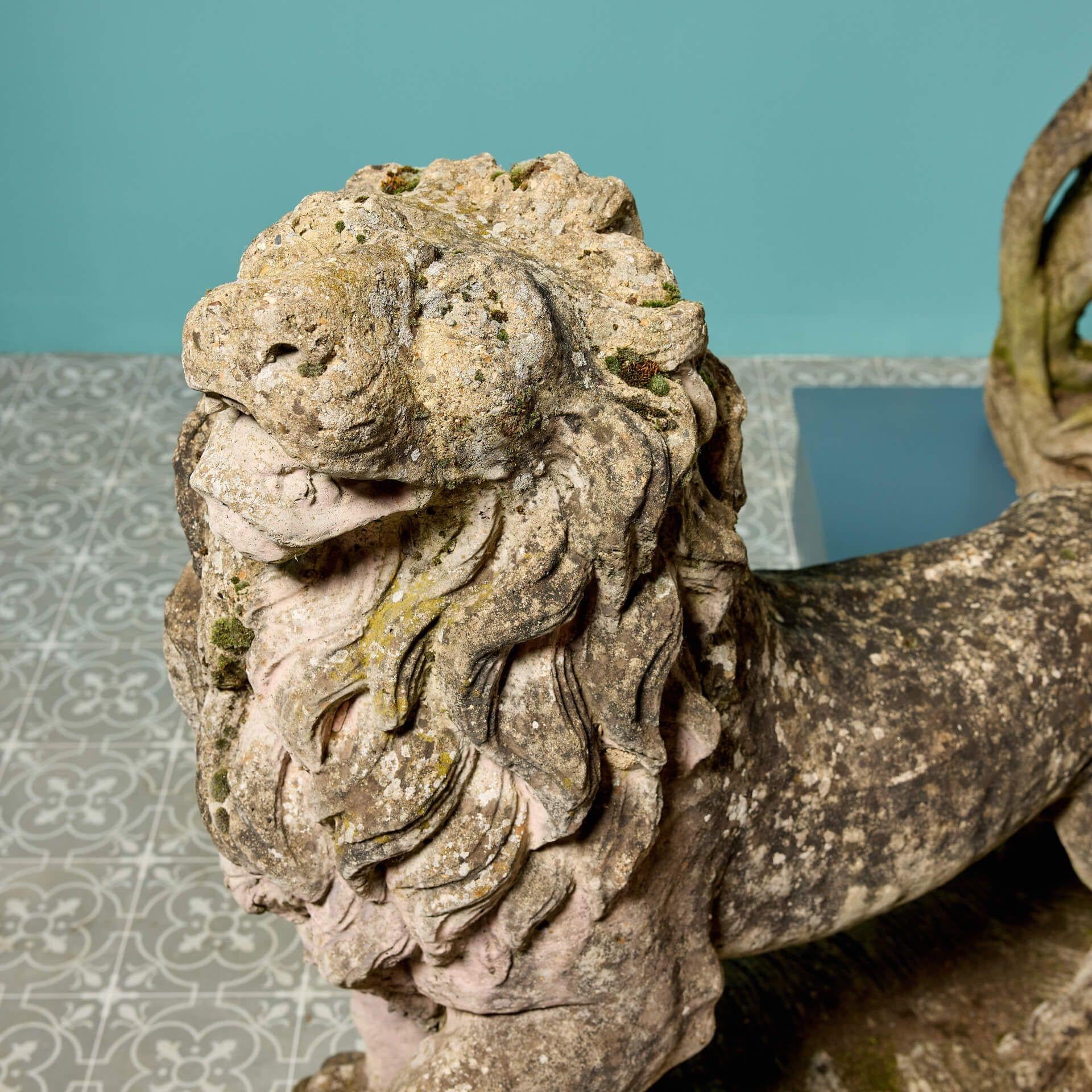 English Pair of Large Weathered Stone Lion Statues For Sale