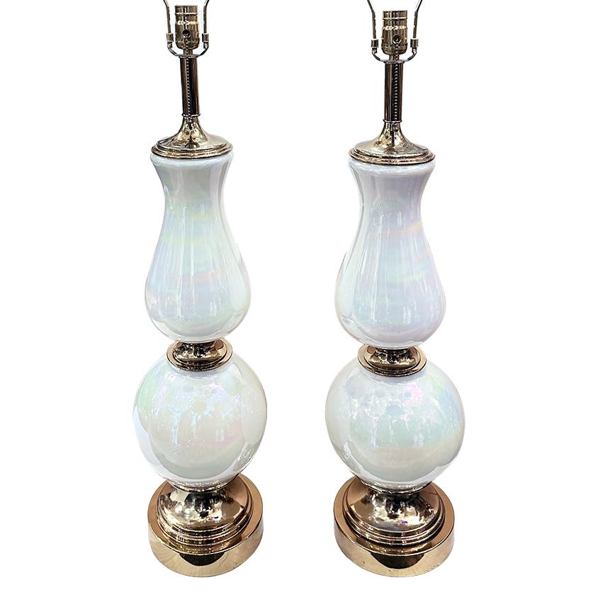 Pair of circa 1960's oversized French opalescent white glass lamps with metal bases.

Measurements:
Height of body: 30