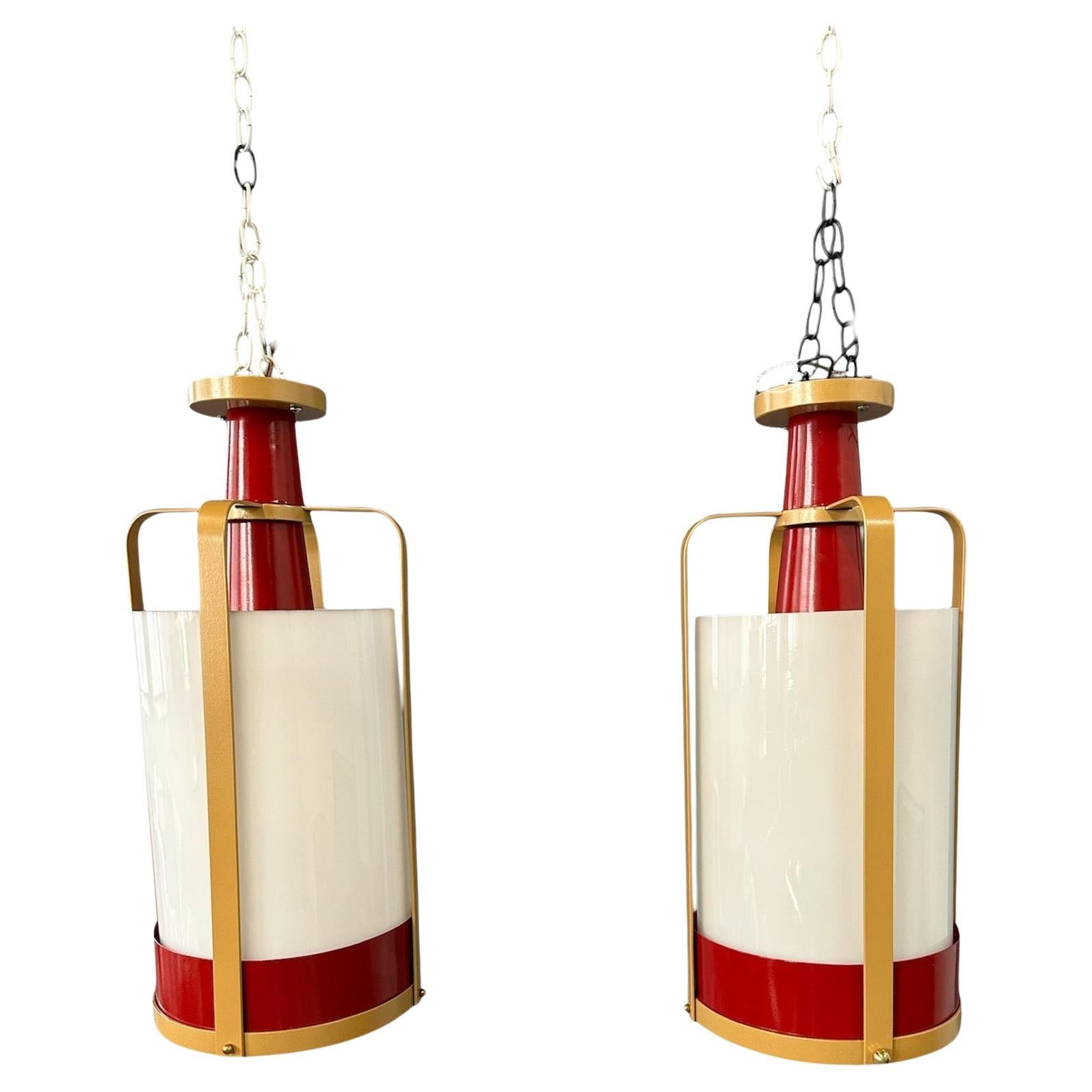 Pair of Large White Glass Pendant Lights with Brass and Red Colored Frame