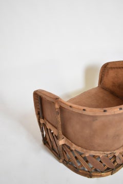 Pair of large wood and leather mexican armchairs, 1970s.