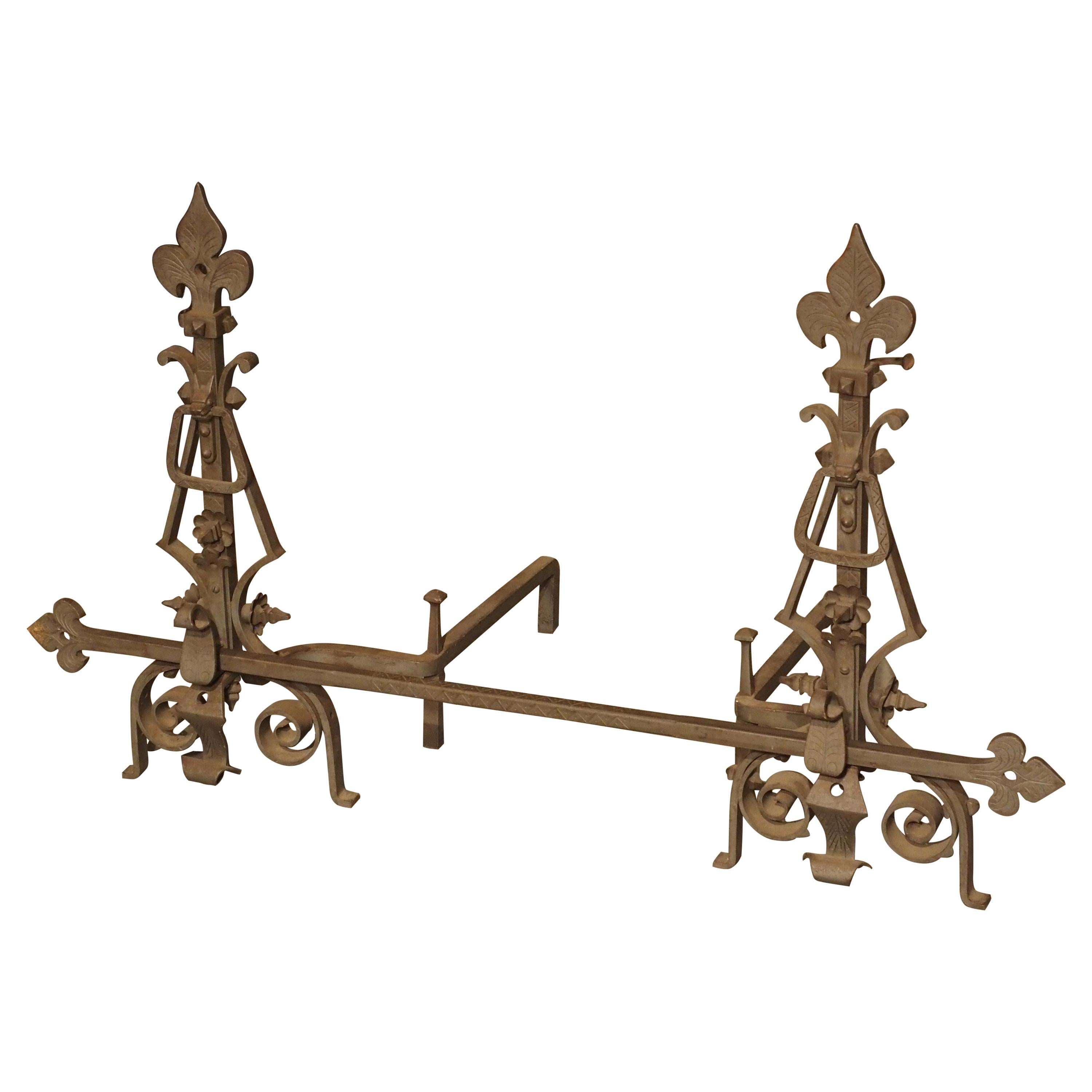 Pair of Large Wrought Iron Fleur De Lys Chenets with Cross Bar For Sale