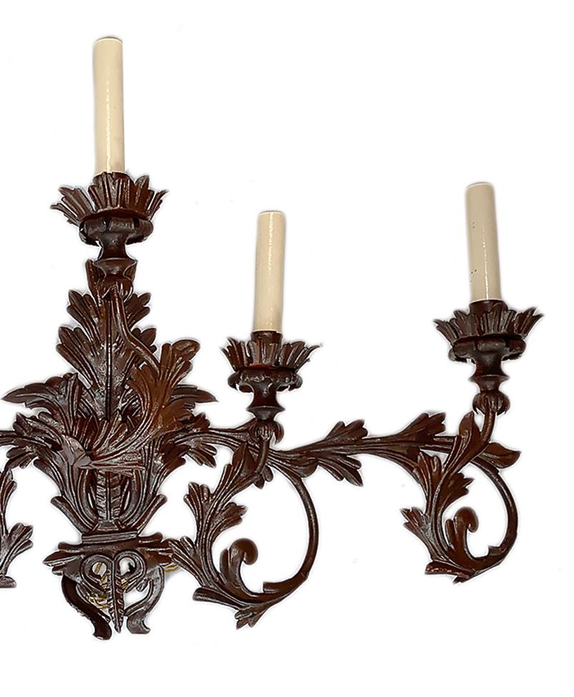 Pair of French iron five-light sconces with scrolling foliage motif and original patina.

Measurements:
Height: 19