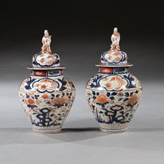 Pair of Late 17th Century Edo Period Japanese Arita Imari Vases and Covers