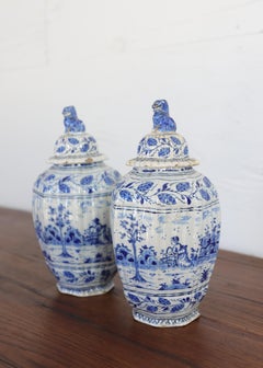 Pair of Late 18th c. French Earthenware Jars with Lions Head Details