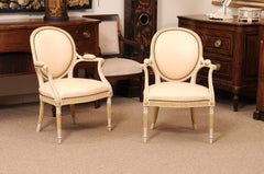 Pair of Late 18th Century Continental Neoclassical Painted & Parcel Fauteuils