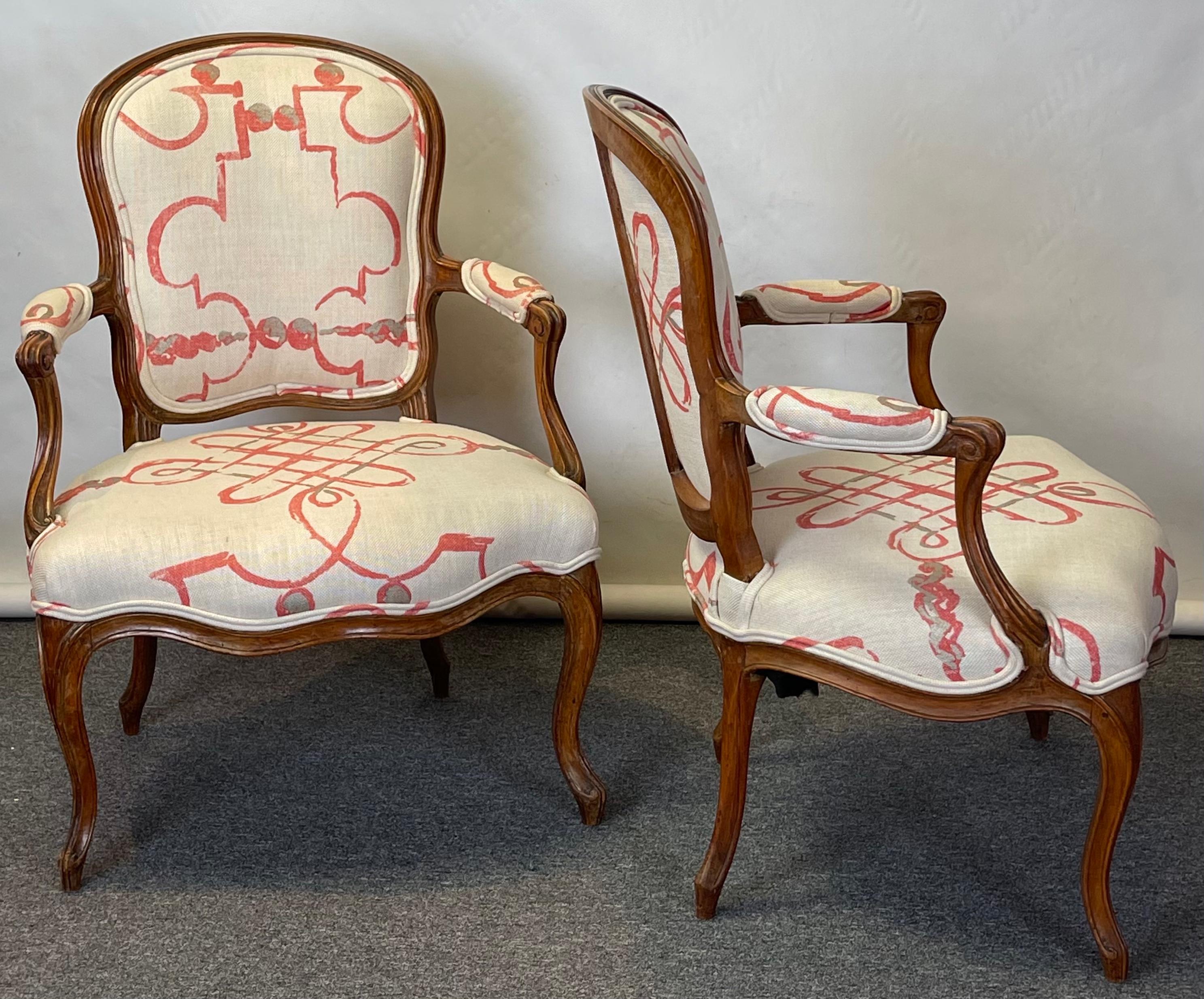 Hand-Crafted Pair of Late 18th Century French Carved Walnut Fauteuils