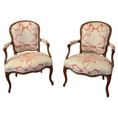 Pair of Late 18th Century French Carved Walnut Fauteuils