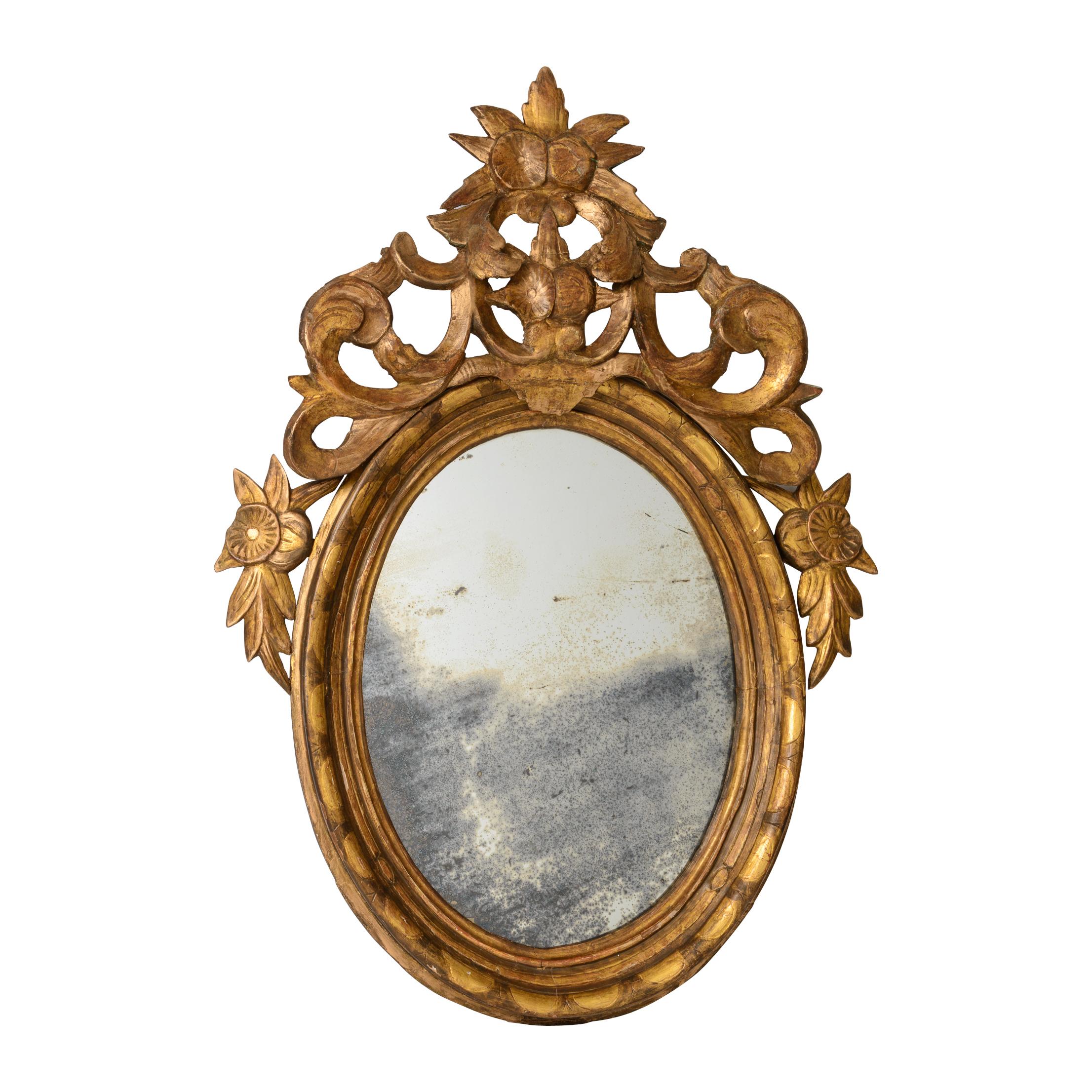 Hand-Crafted Pair of Late 18th Century French Louis XVI Carved Gilt-wood Oval Wall Mirrors For Sale