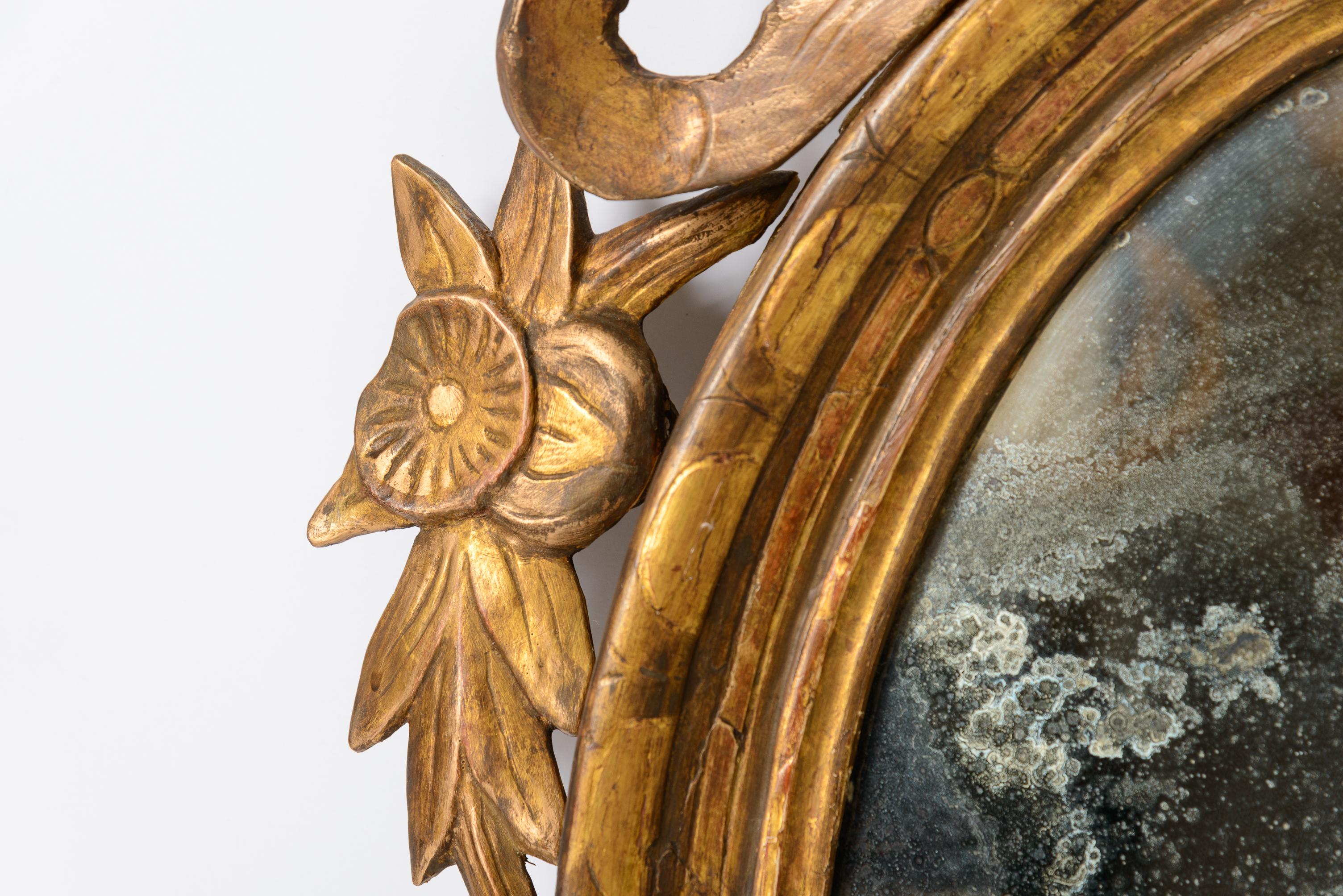 Pair of Late 18th Century French Louis XVI Carved Gilt-wood Oval Wall Mirrors For Sale 2