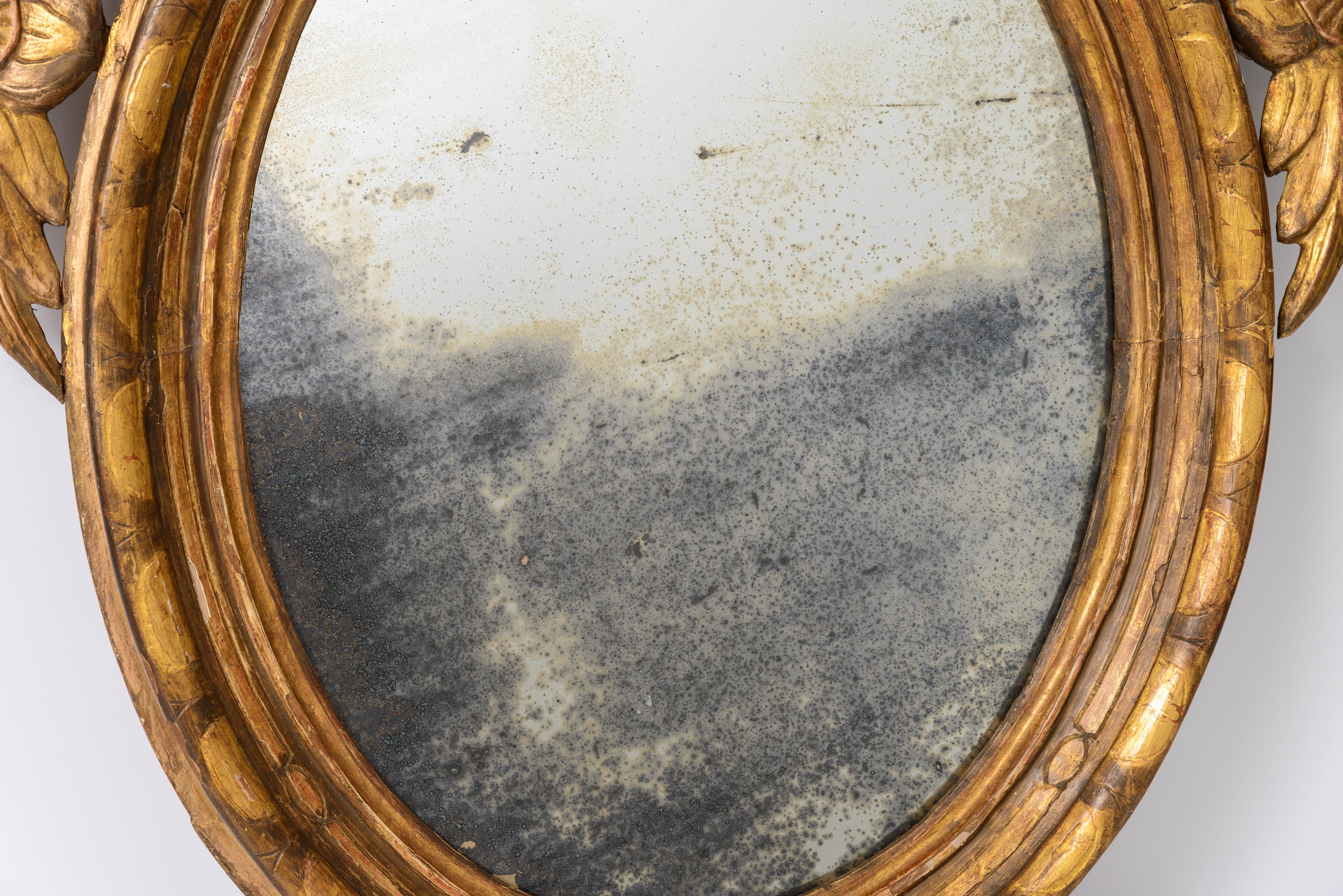 Pair of Late 18th Century French Louis XVI Carved Gilt-wood Oval Wall Mirrors For Sale 4