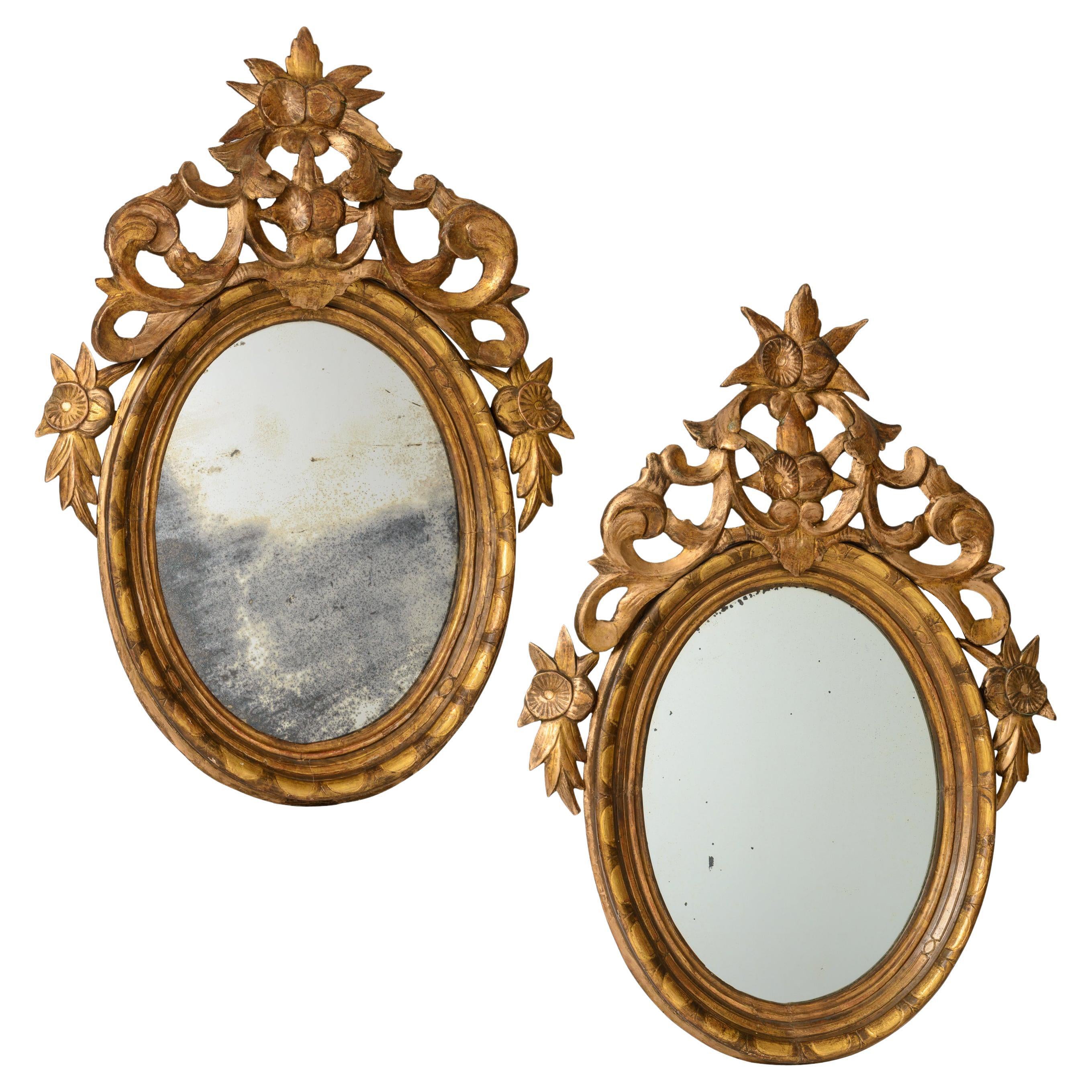 Pair of Late 18th Century French Louis XVI Carved Gilt-wood Oval Wall Mirrors For Sale