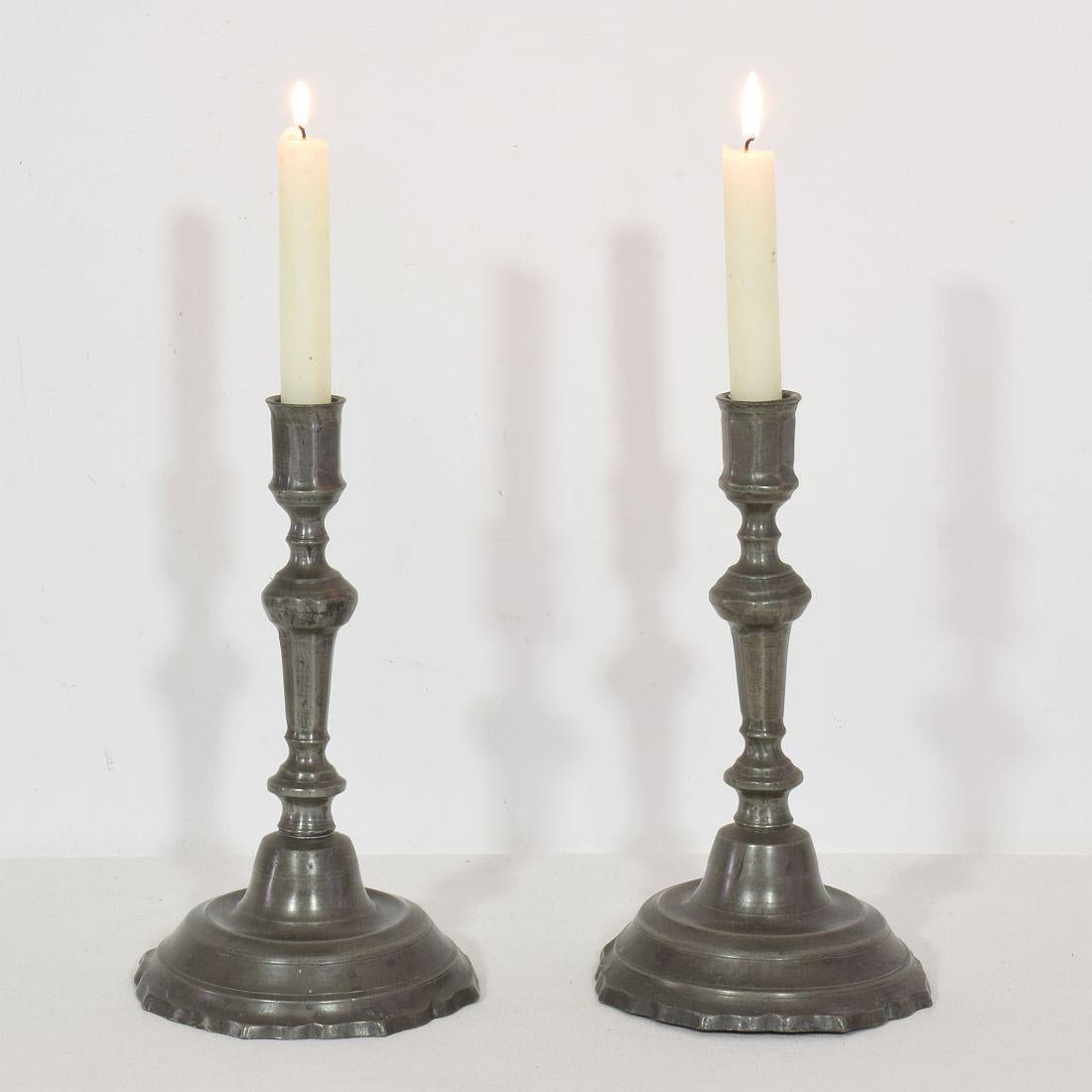 Lovely pair of pewter candle holders with a beautiful patine.
France circa 1780.
Weathered condition with minor losses.
