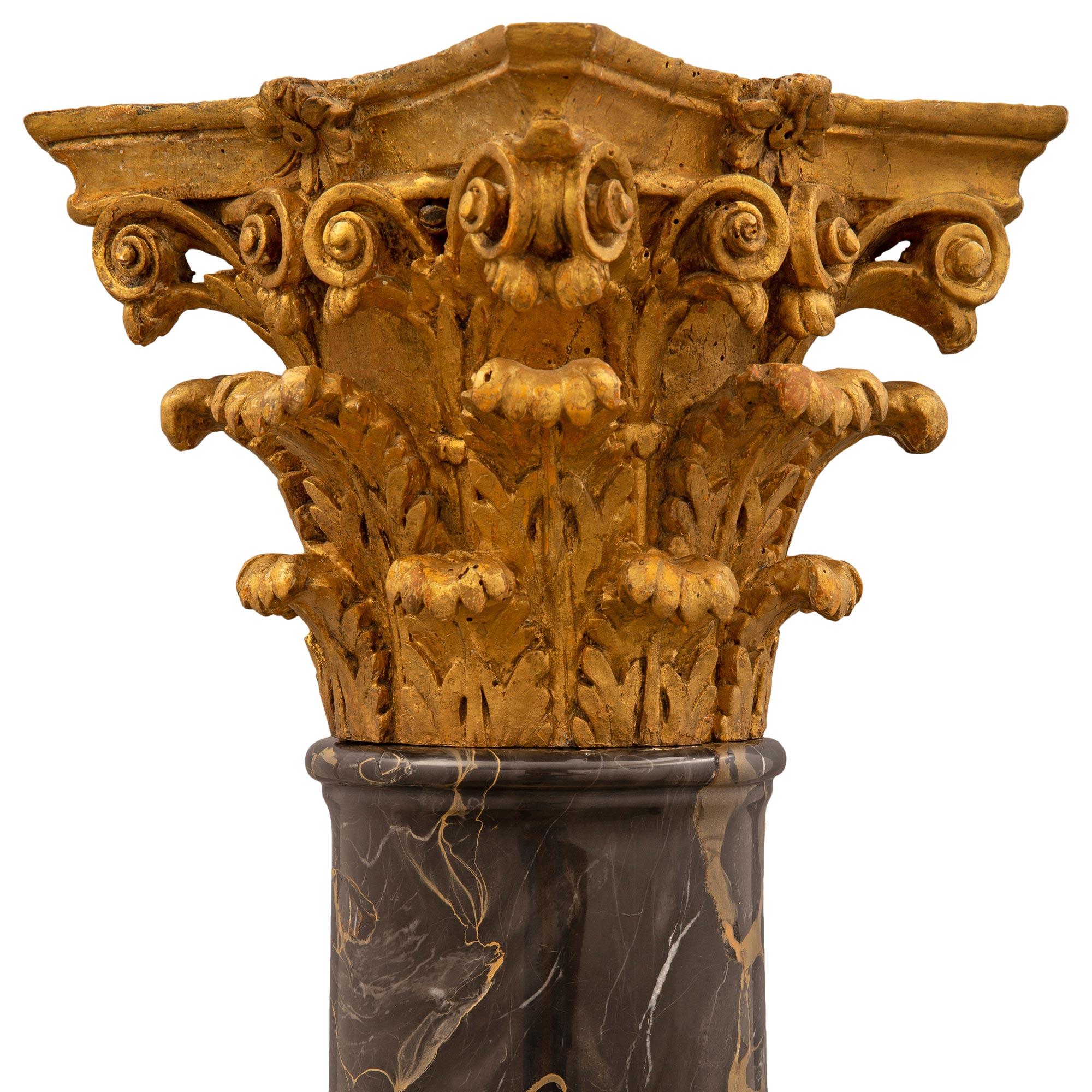 Italian Pair of Late 18th Century Giltwood, Portor and Marble Columns For Sale
