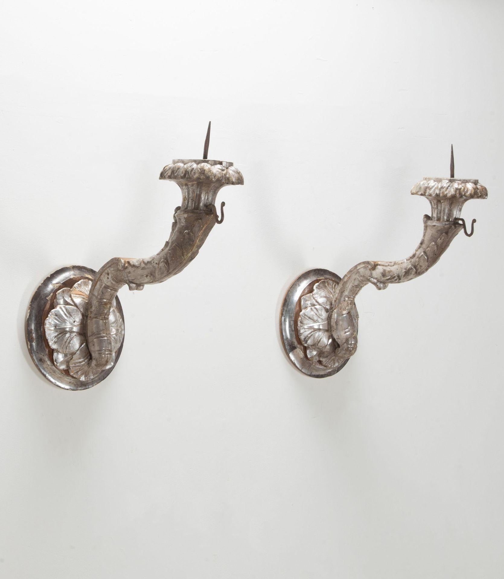 Fabulous pair of late 18th Century Italian silver gilt pricket candle sconces.