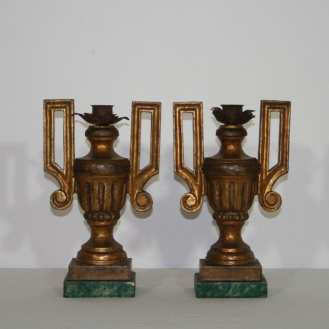 Fabulous pair of neoclassical candleholders
Italy, circa 1780
Weathered, old repairs.