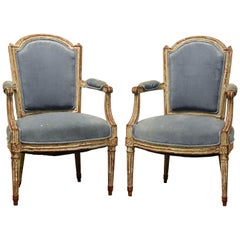 Pair of Late 18th Century Louis XVI Carved and Painted Upholstered Armchairs