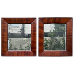 Pair of late 18th Century Regency Flame Mahogany Mirrors.