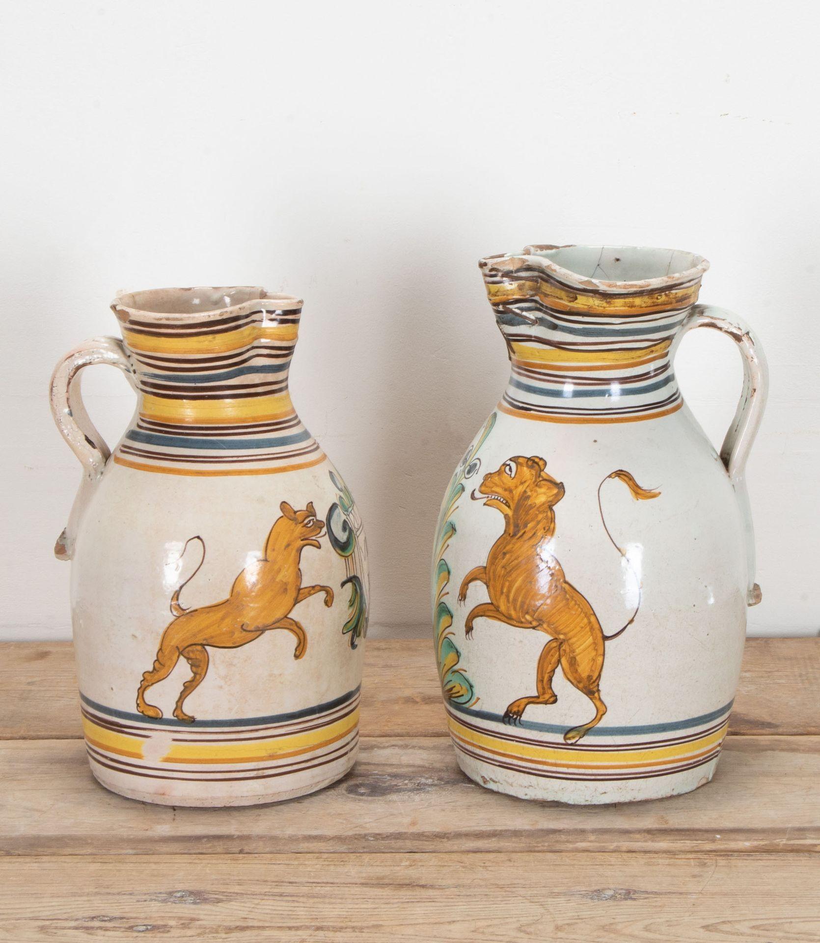 Pair of late 18th Century Spanish earthenware jugs from Puente del Arzobispo.
With wonderful hand painted polychrome decoration. 
Old staple repairs to the neck of larger jug. 

Dimensions: 36cm x 25cm x 25cm and 34cm x 23cm x 23cm.