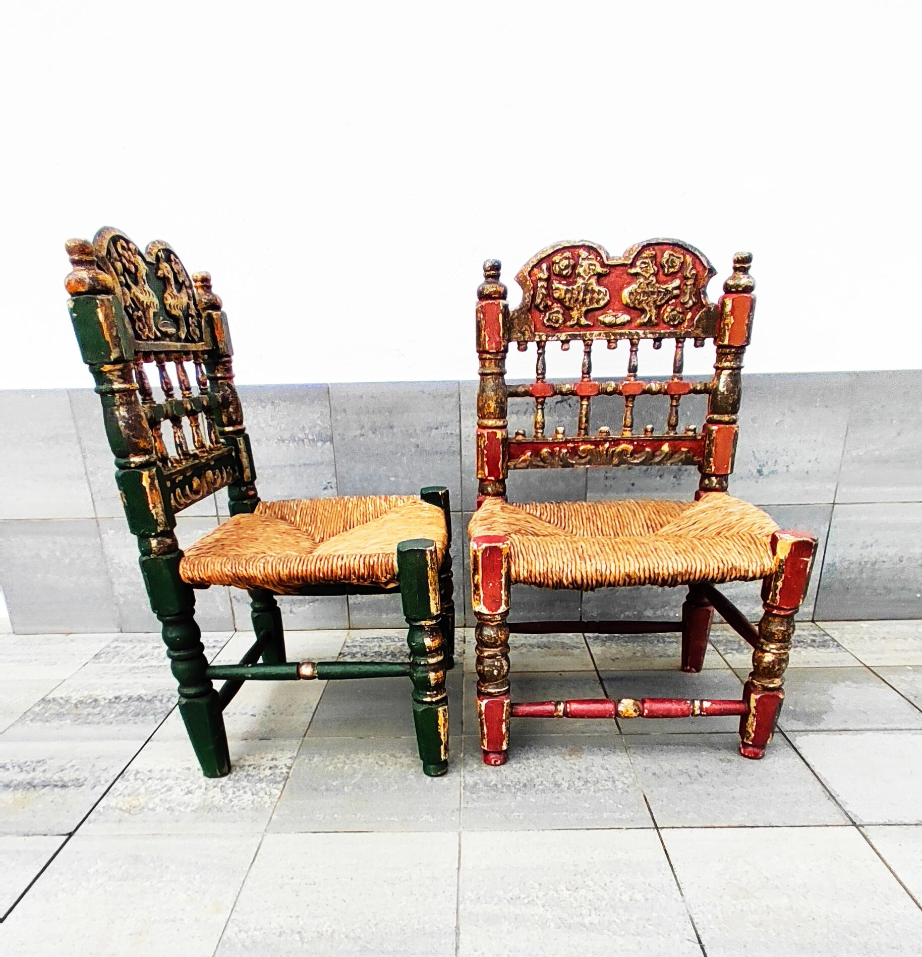 Beautiful pair of late 18th century side chairs manufactured in Spain. In very good vintage condition. Side chairs with carved cresting rail above quarter-woven seat on turned legs terminating in ball feet. Possibly Majorcan, circa 1780.