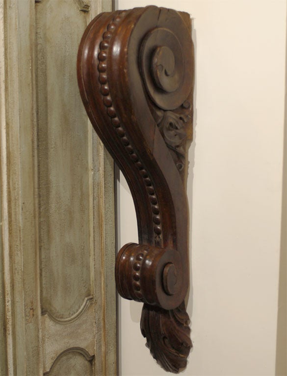 Pair of late 18th century walnut Italian corbels from the Italian piedmon.