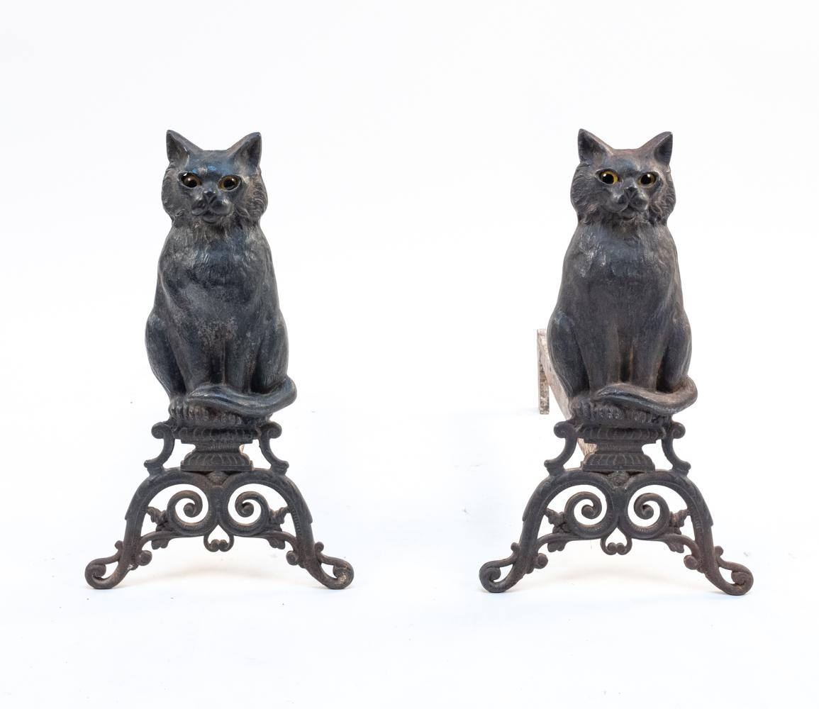 Add feline mystique to your hearth with these antique andirons in the form of perched black cats, whose glass marble 