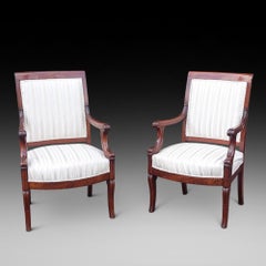 Pair of Late 19th Carved Mahogany Armchairs