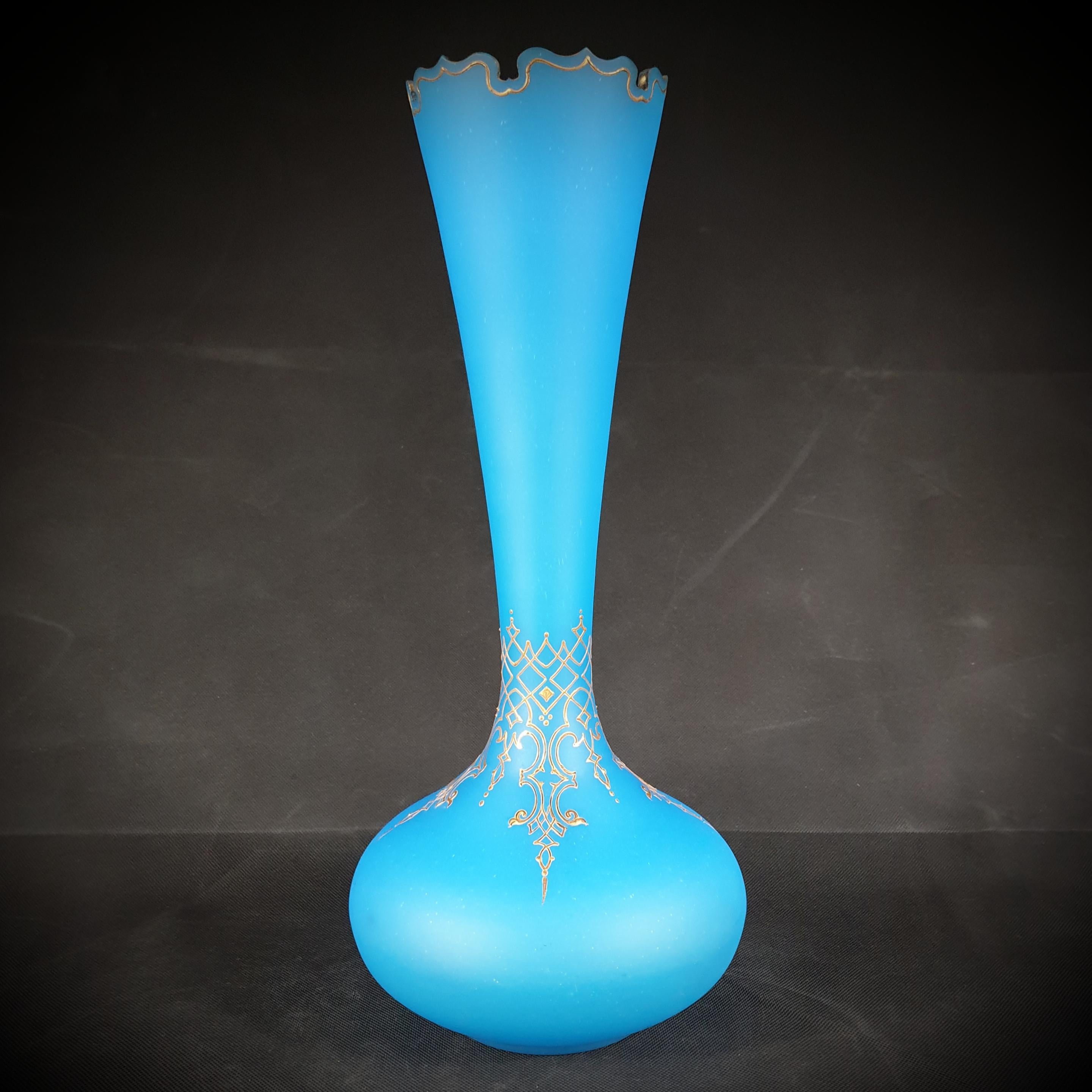 Are you looking for a gorgeous set of vases that will instantly transform any room? Look no farther than this pair of opaline blue vases, which are large and elegantly designed! These vases, made in France between the late 1800s and the early 1900s,