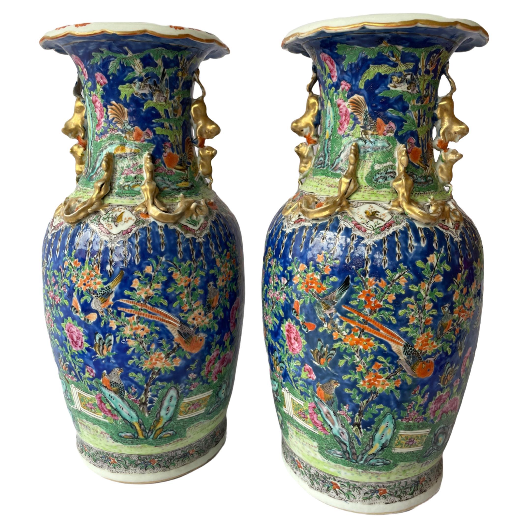 Pair of Late 19th Century Cantonese Famille Rose Vases in Porcelain For Sale