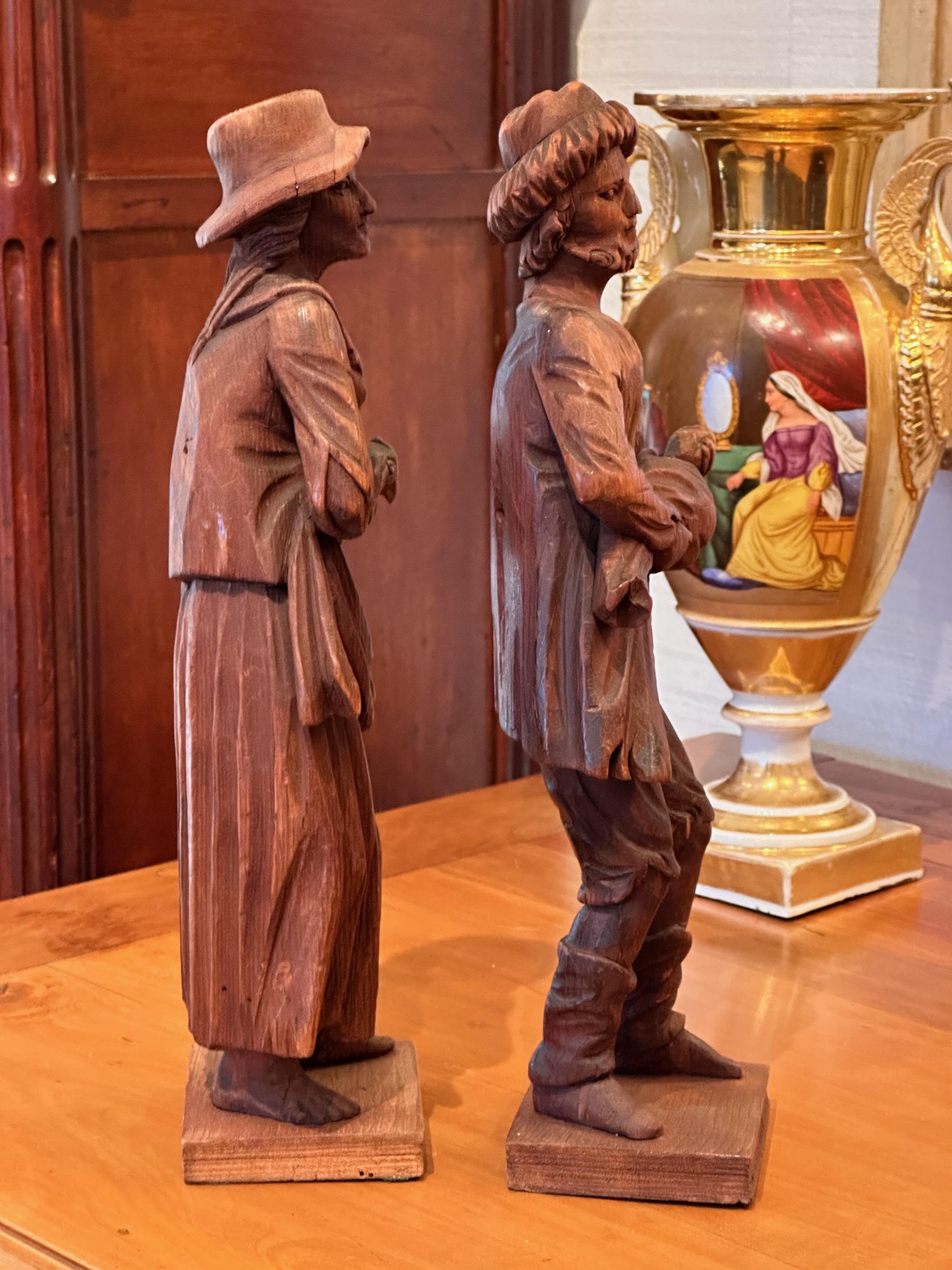 Pair of Late 19th Century Carved Peasants In Good Condition For Sale In Charlottesville, VA