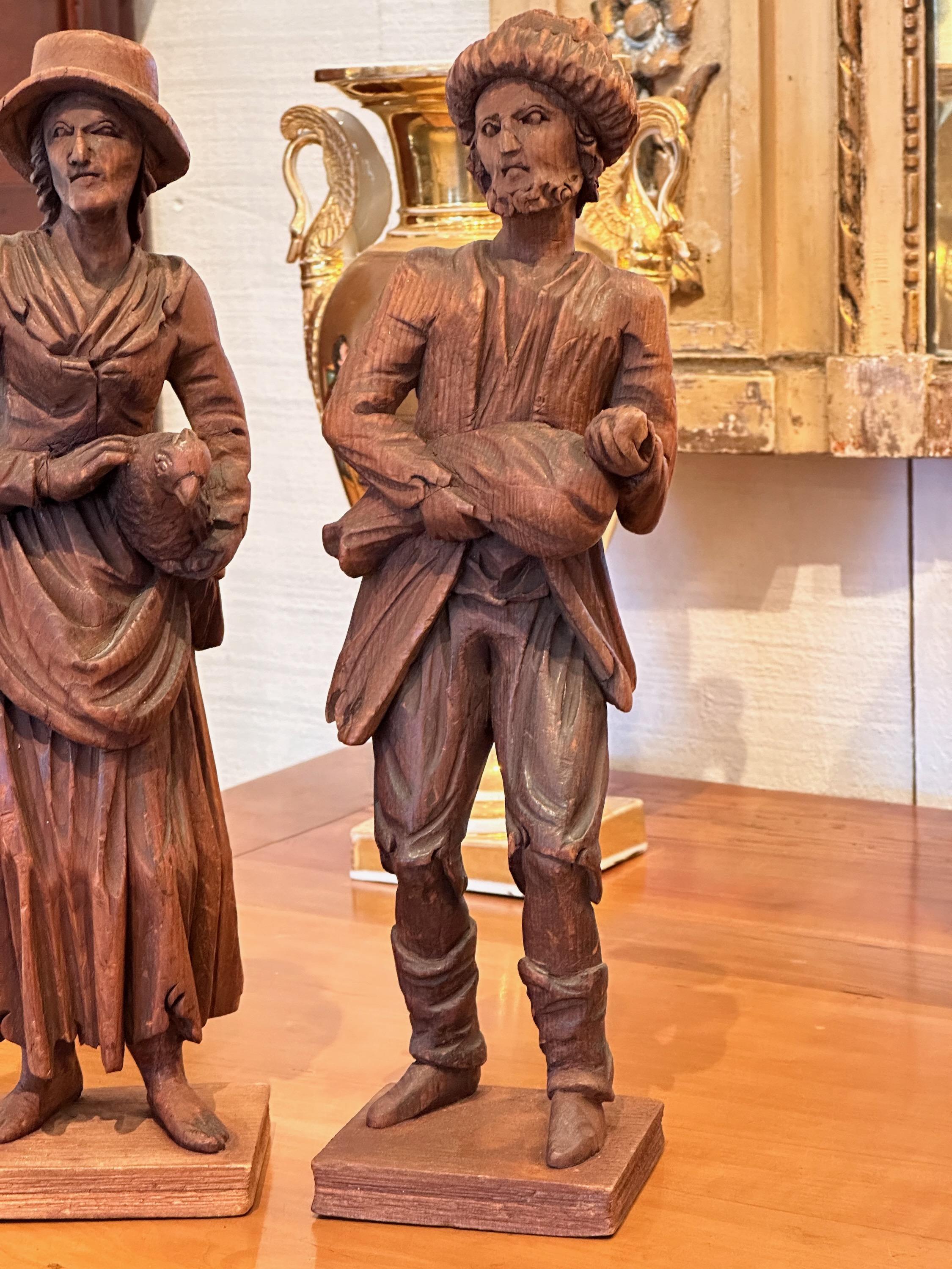 Wood Pair of Late 19th Century Carved Peasants For Sale