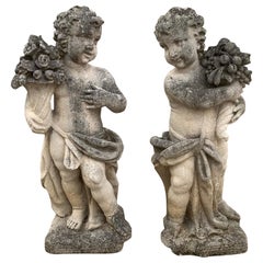 Pair of Late 19th Century Cast Stone Garden Statues of Putti