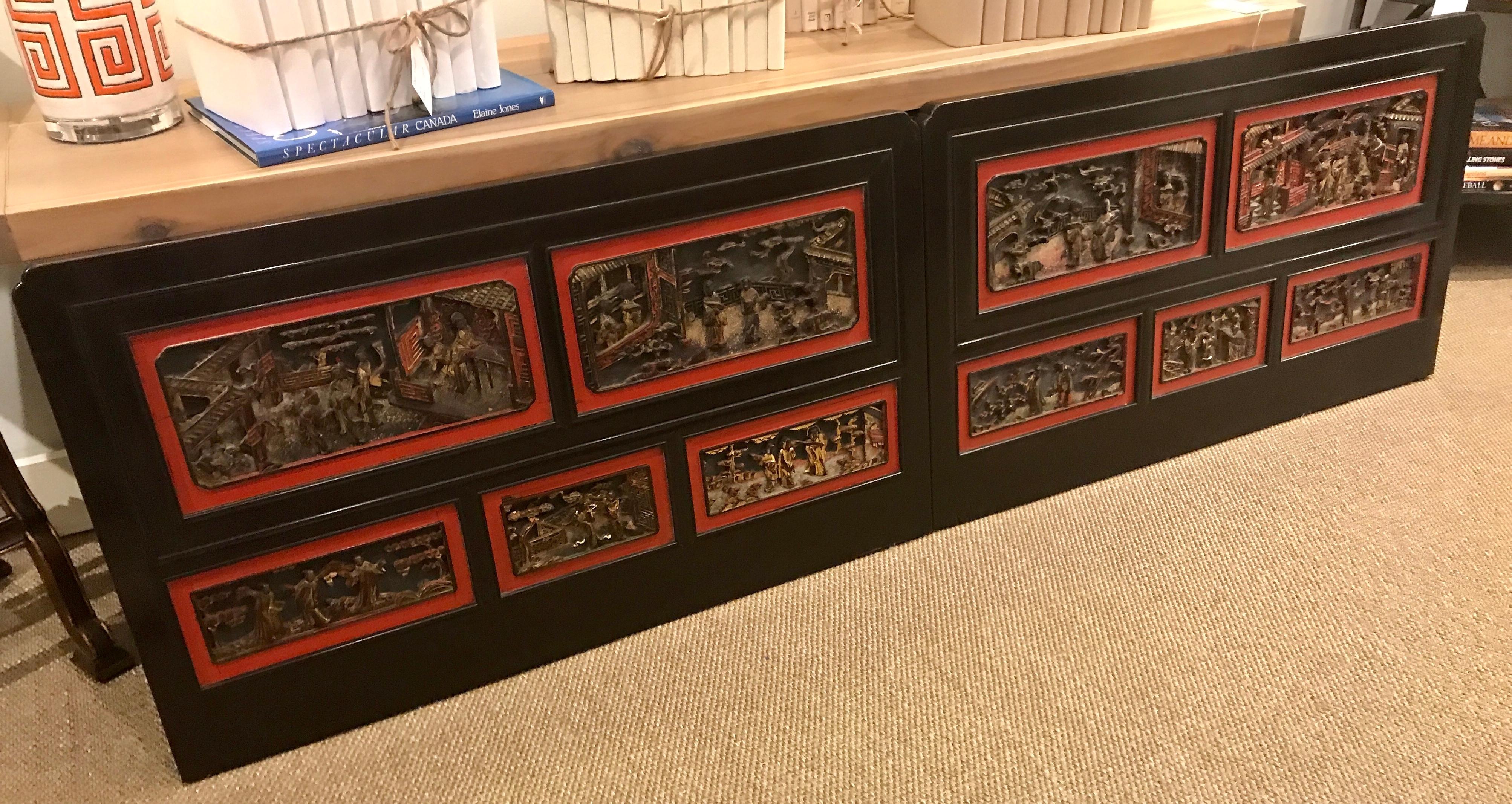 Pair of late 19th century Chinese carved panels/ twin headboards
Each one finely carved with five inset carved giltwood court and landscape scenes, with iron red lacquer surround.
Previously used as twin head boards, can be used above doors or any