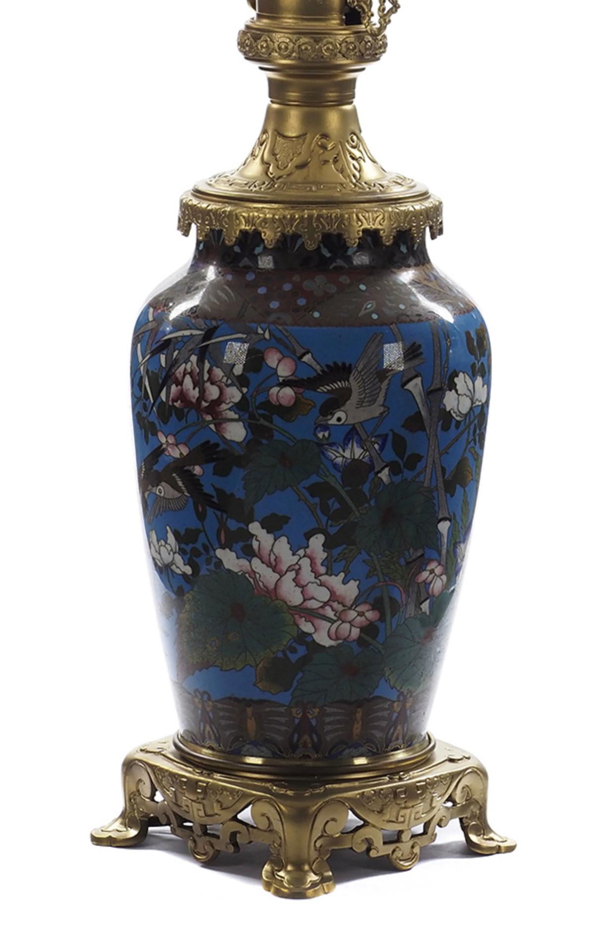 A PAIR OF CHINESE CLOISONNÉ VASES MOUNTED AS LAMPS

In the 17th century England & Holland, two small, warlike seafaring nations vied for supremacy in the newly established trade in the then extraordinary commodities, such as spices, silks,