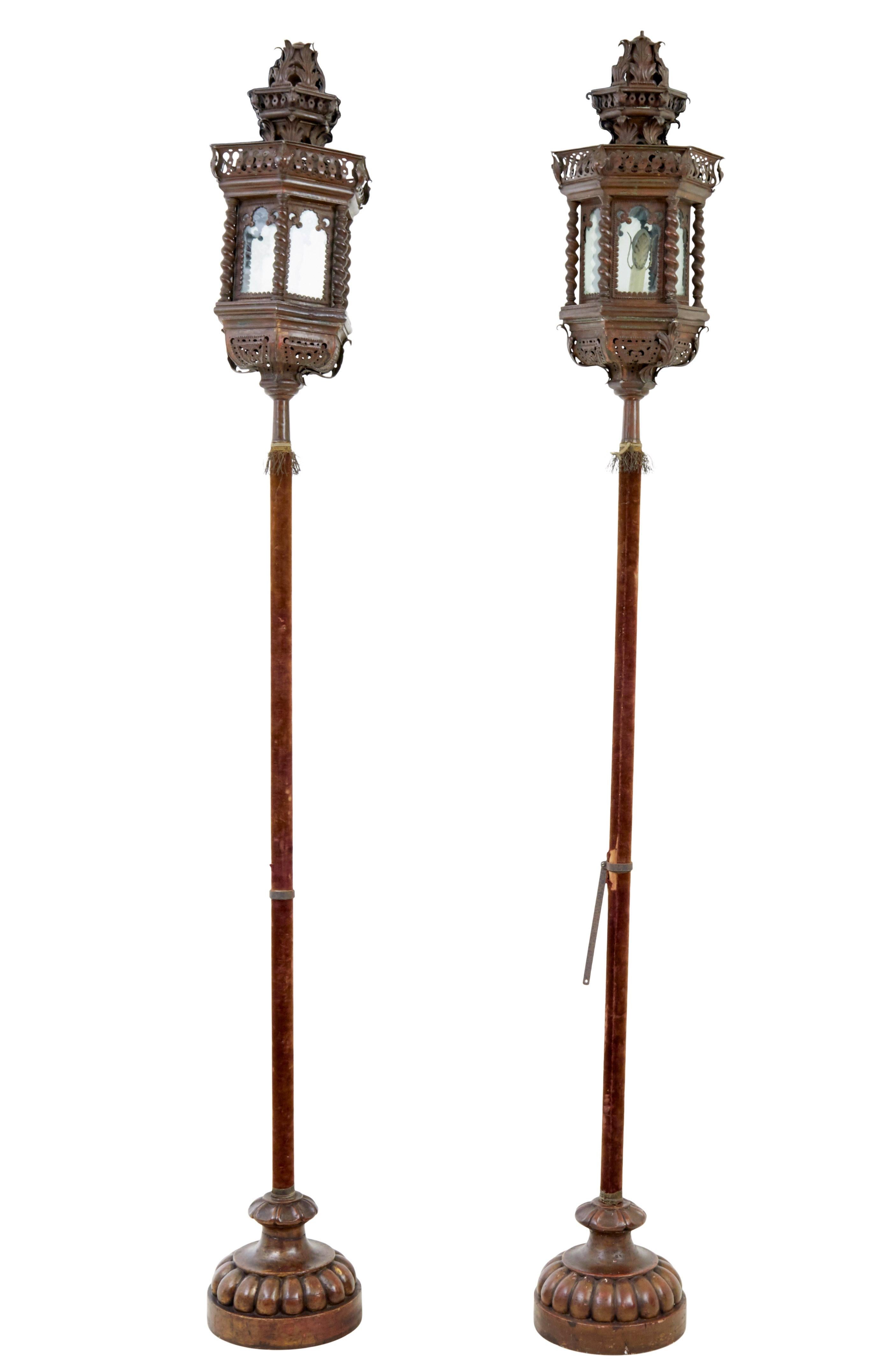 Pair of late 19th century copper venetian lamps on poles circa 1890.

Hexagonal in shape with original glass.  Later converted to electric. Beautifully pressed and pierced metalwork, with barley twist columns. We believe the velvet clad poles and