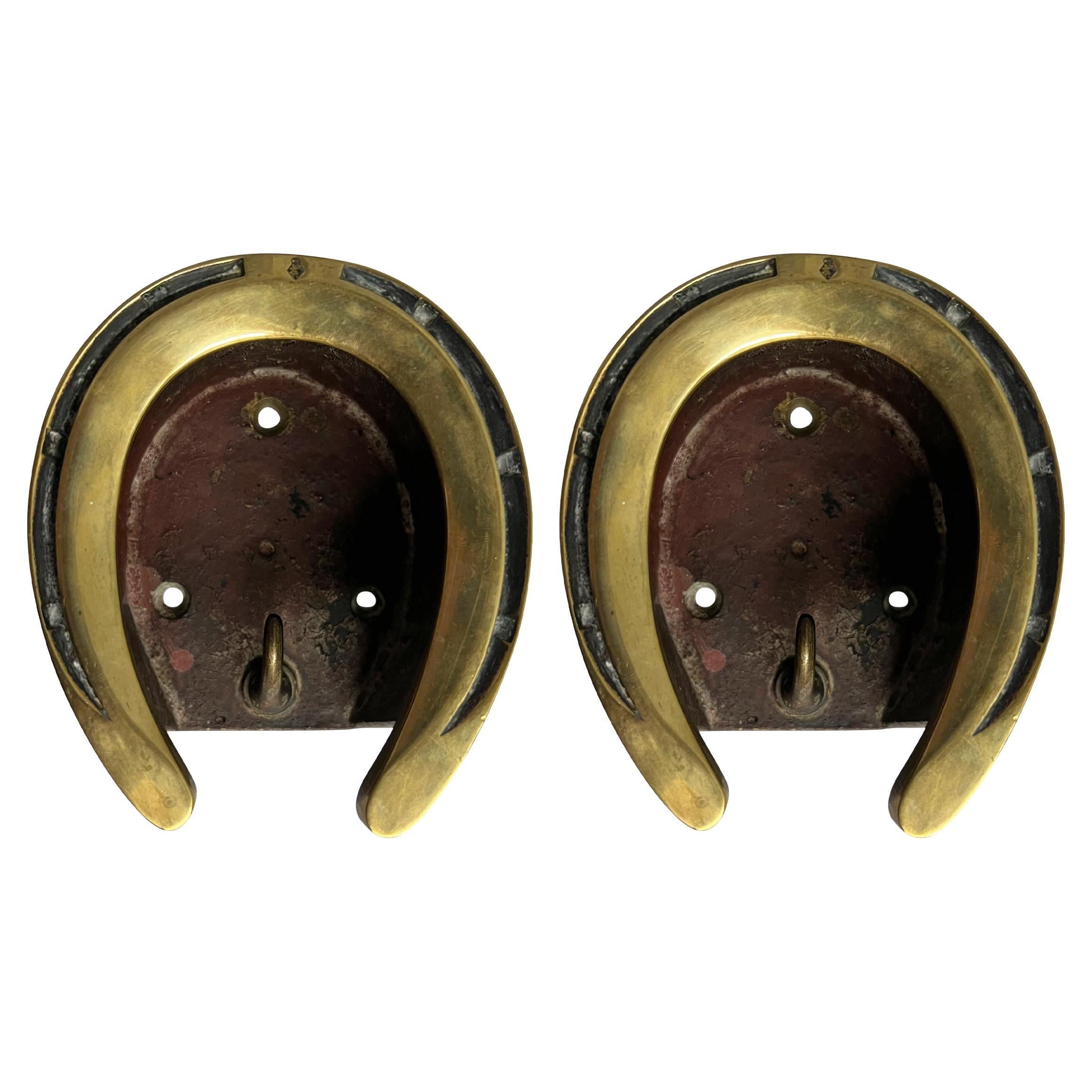 Pair of Late-19th Century English Brass Horseshoe Bridle Hooks
