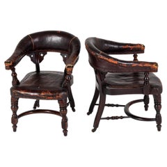 Antique Pair of Late 19th Century English Mahogany and Rexine Armchairs