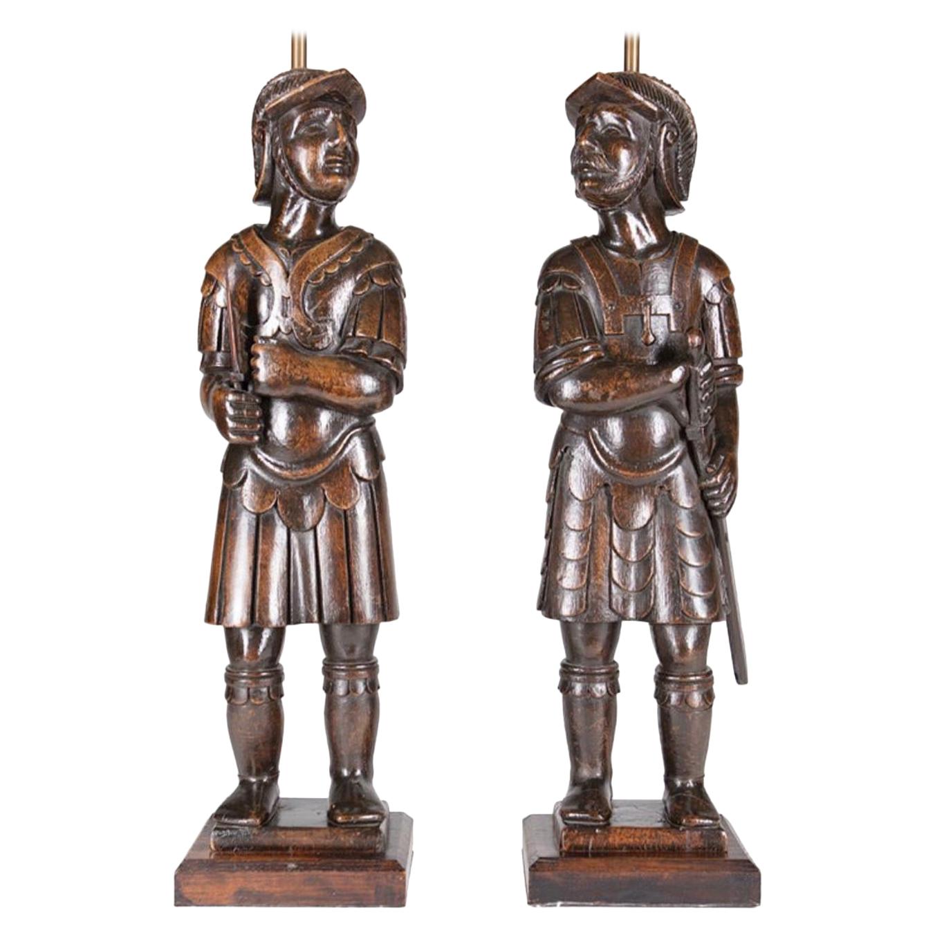 Pair of late 19th-early 20th century Gothic Revival carved warriors mounted as lamps 

Measures 23.5