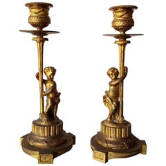 Pair of Late 19th Century French Bronze Gilded Candlesticks