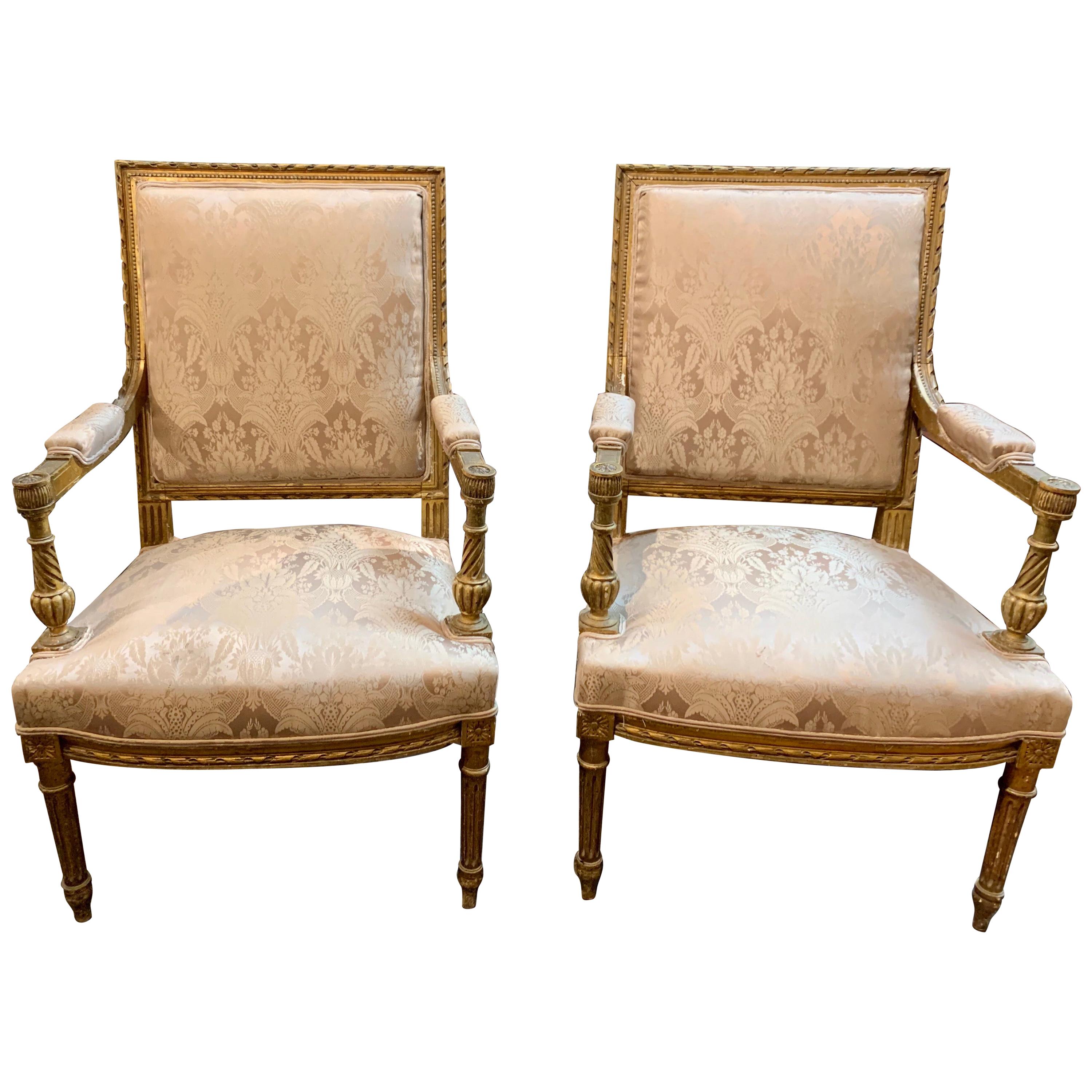 Pair of Late 19th Century French Louis XVI Style Carved Giltwood Armchairs