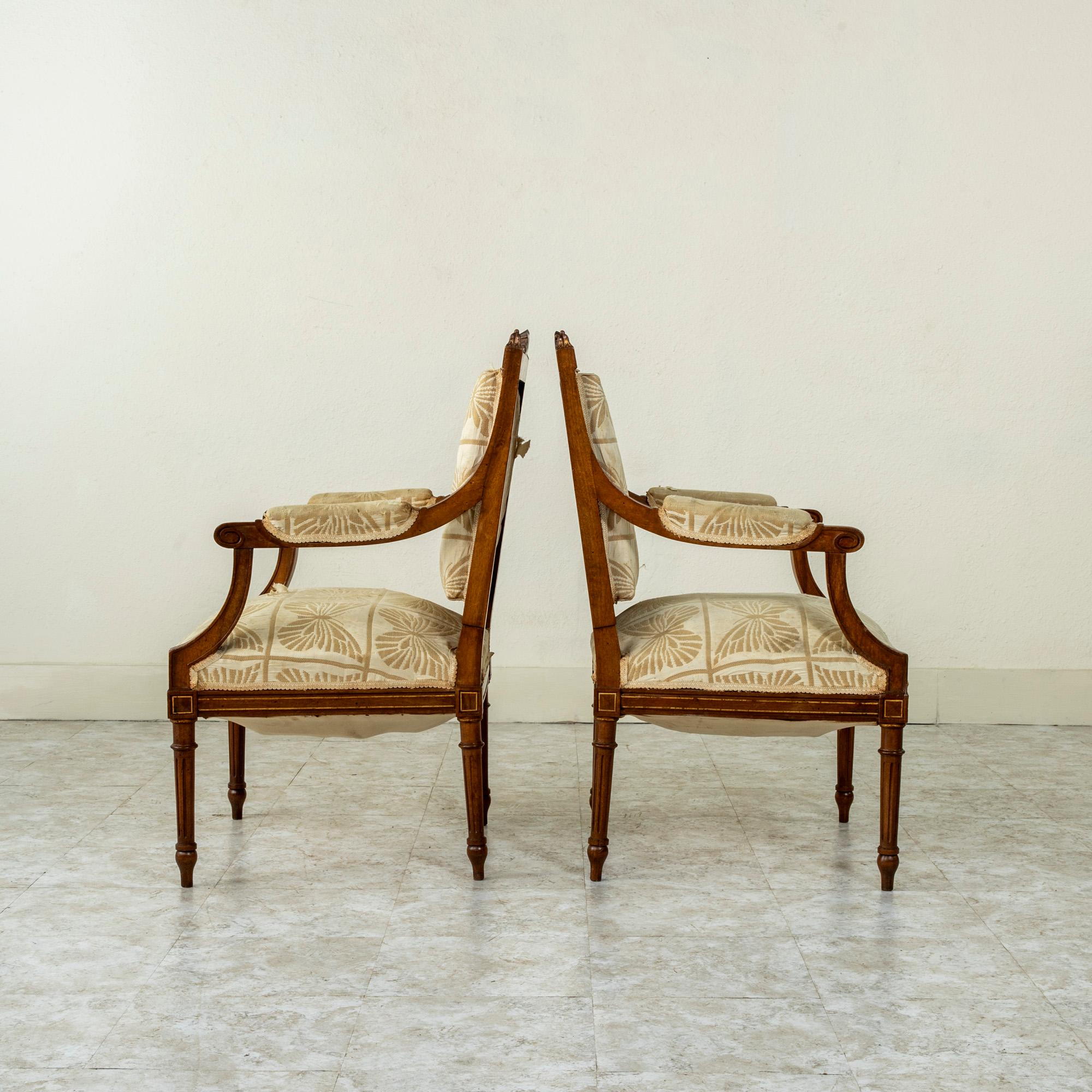 Pair of Late 19th Century French Louis XVI Style Hand Carved Walnut Armchairs In Good Condition For Sale In Fayetteville, AR