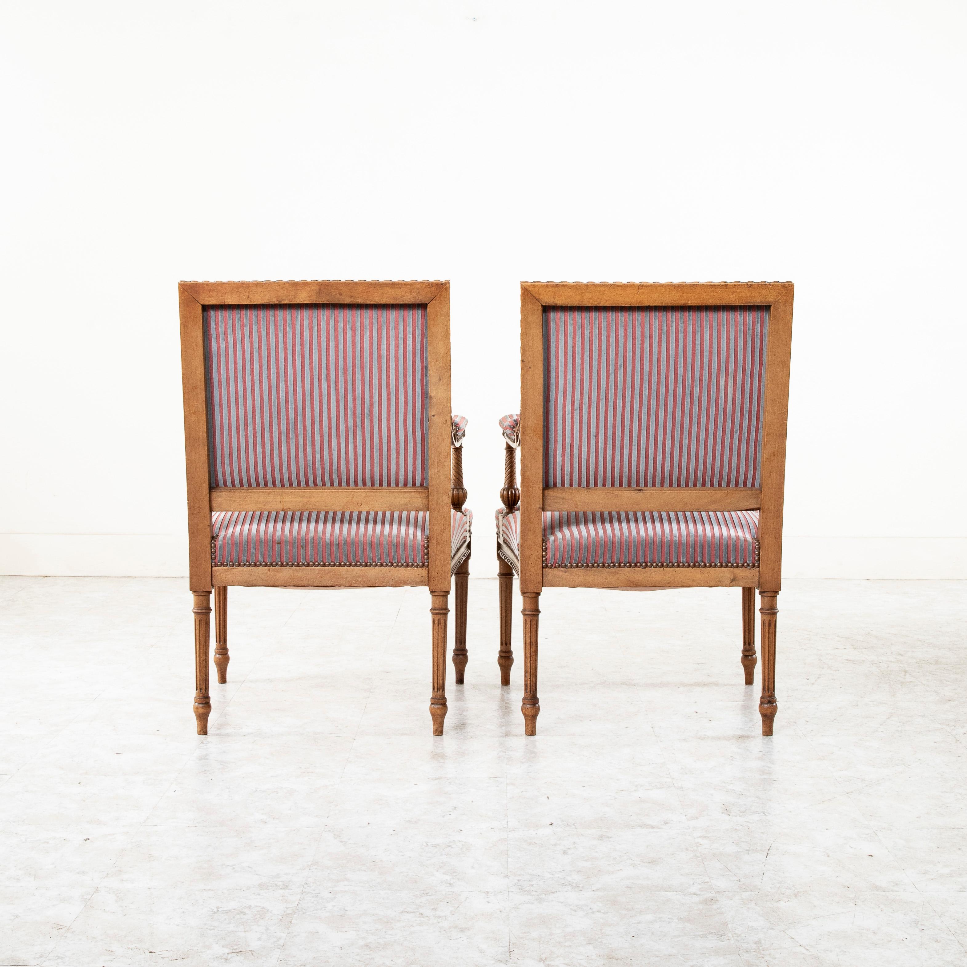 Upholstery Pair of Late 19th Century French Louis XVI Style Hand Carved Walnut Armchairs For Sale