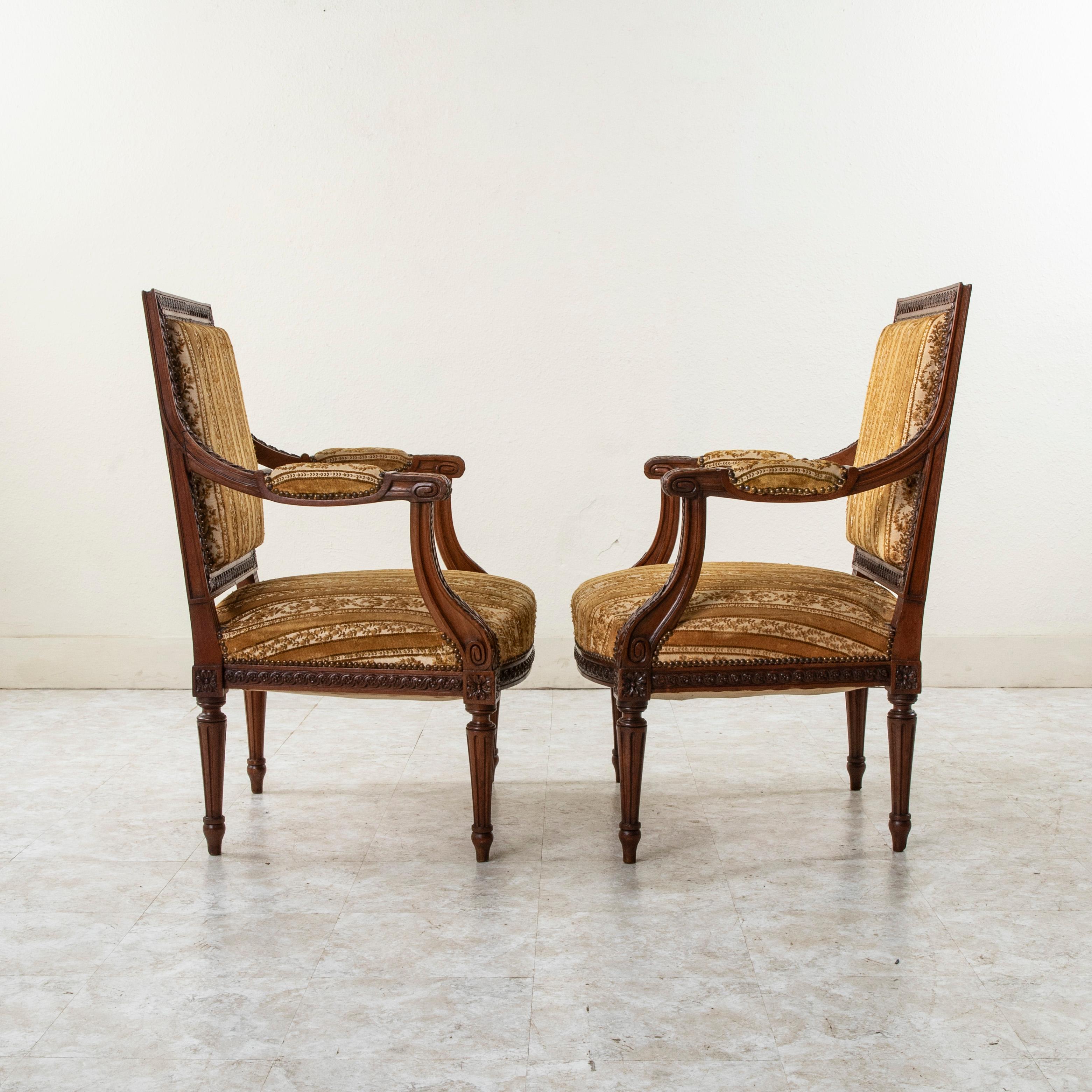 Pair of Late 19th Century French Louis XVI Style Hand Carved Walnut Armchairs For Sale 1